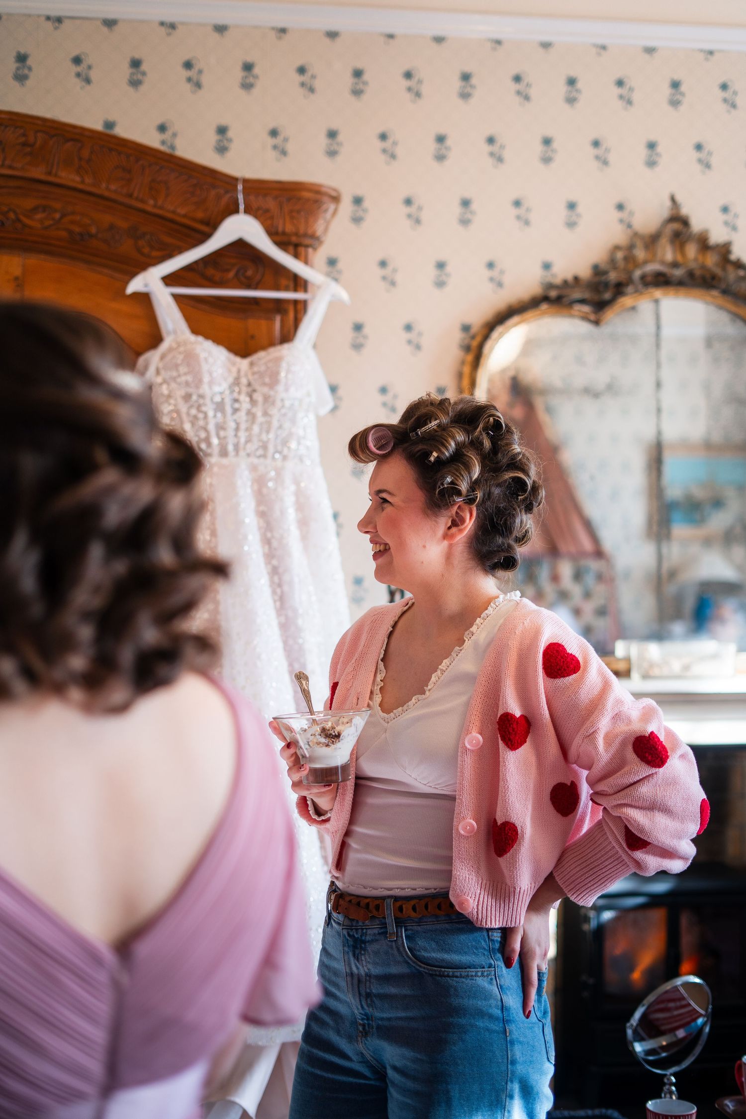 Bride getting ready for her Cornish wedding alongside her bridal party