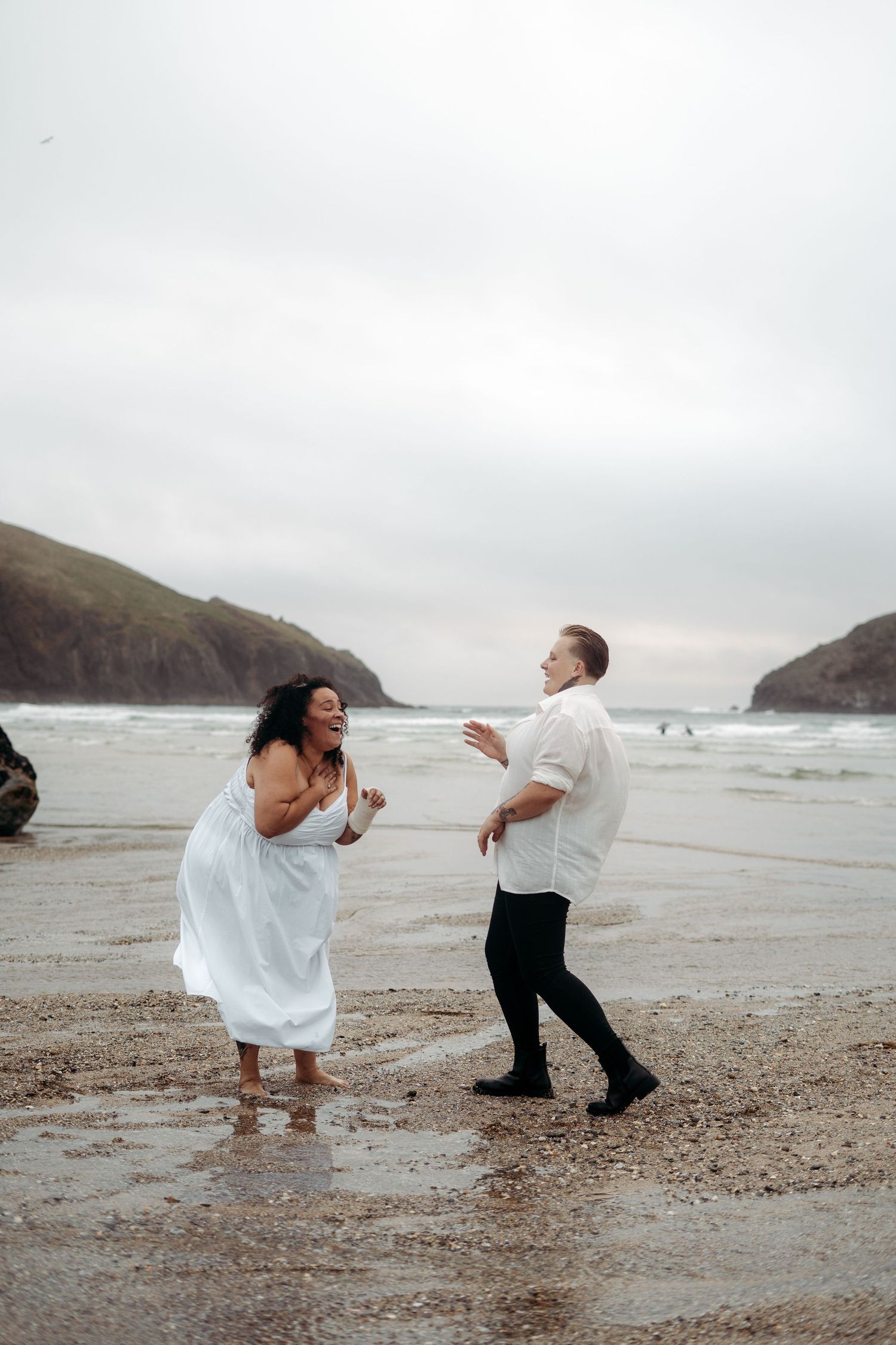 WLW engagement photography on Holywell Bay, Cornwall. Photos taken by lesbian wedding photographer