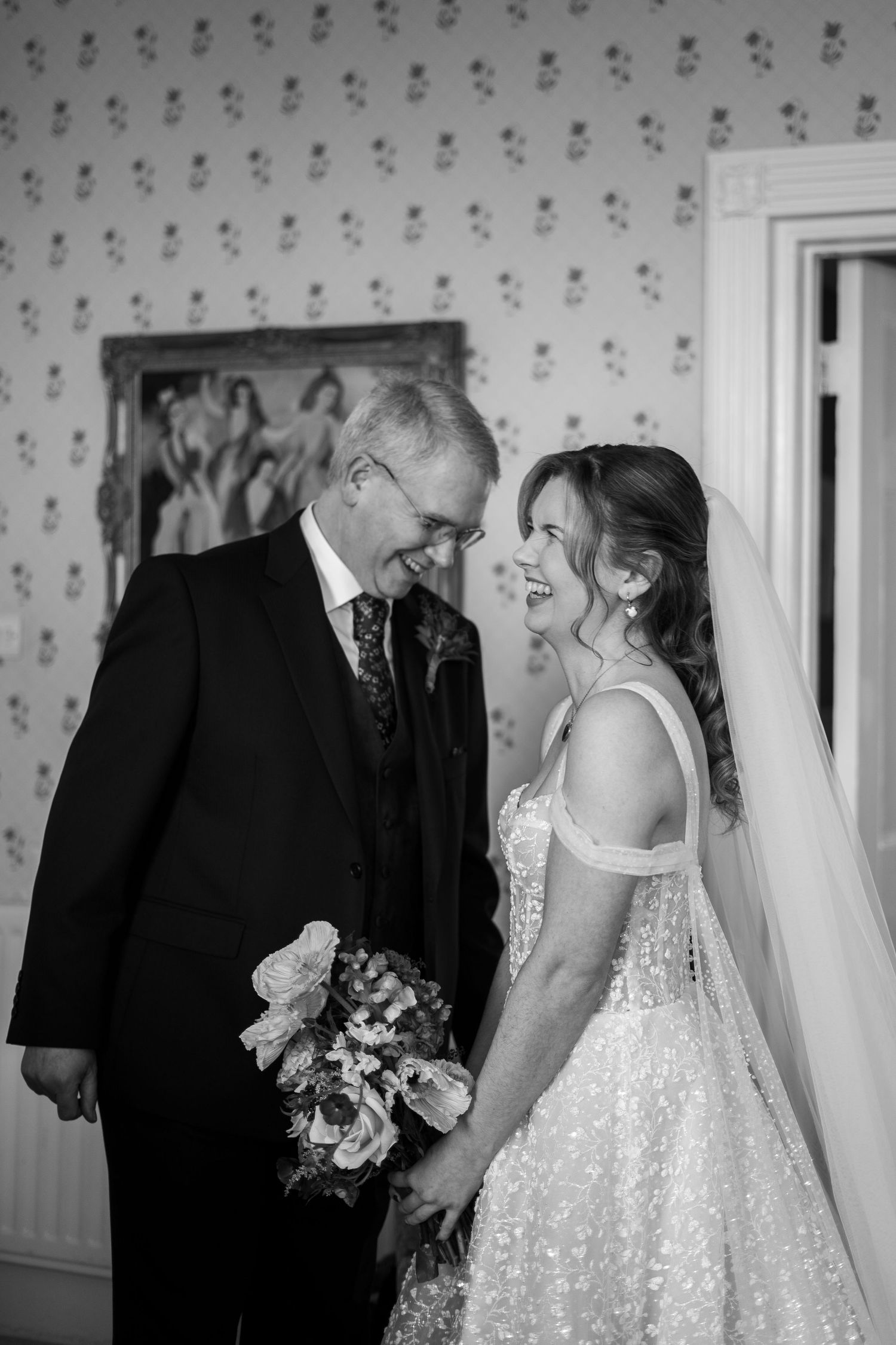 Black and white photo of a first look between a bride and her father during a wedding in Penzance, Cornwall