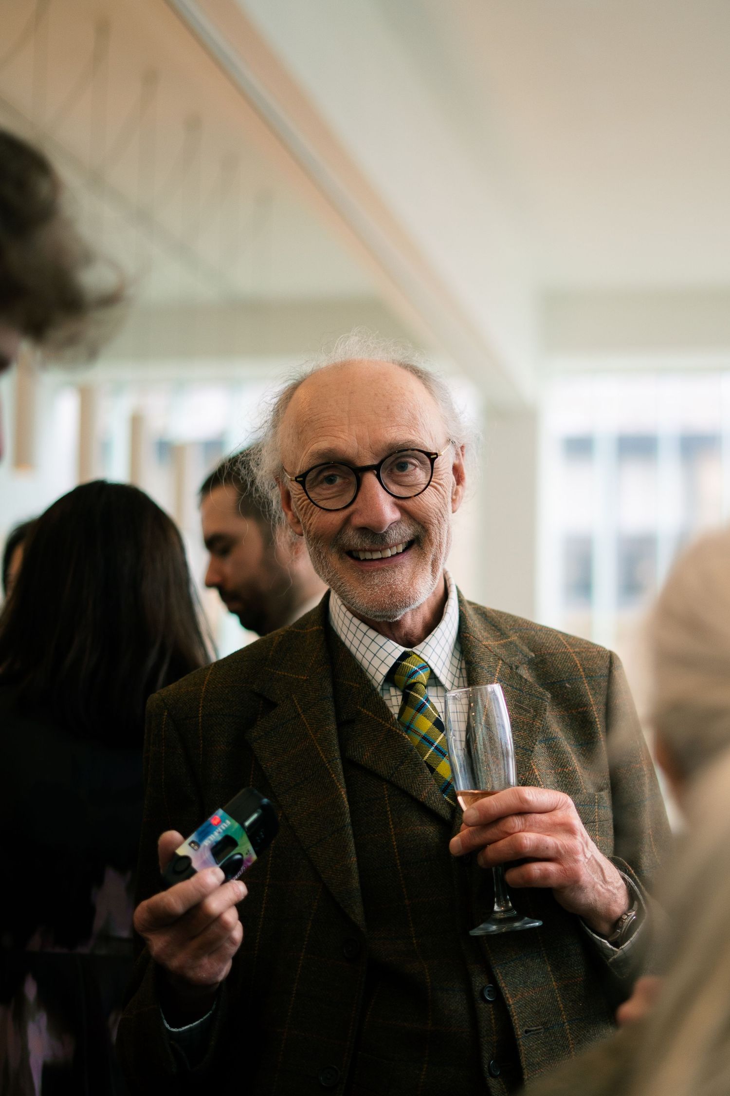 Candid photo of guest at a wedding reception at Newlyn Art Gallery & The Exchange in Penzance, Cornwall