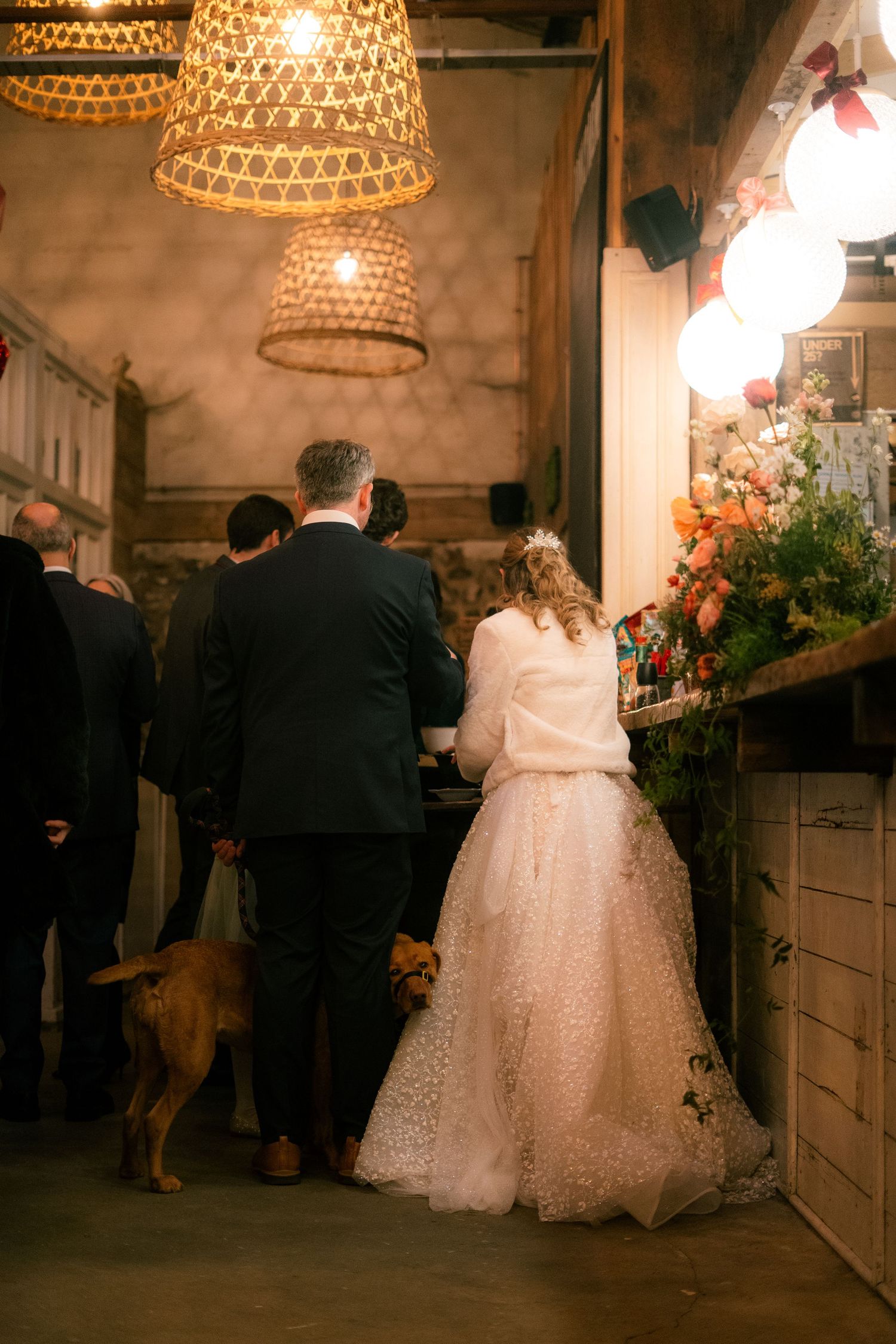 Bride and groom sharing oysters at their wedding reception at 45 Queen Street, Penzance, Cornwall