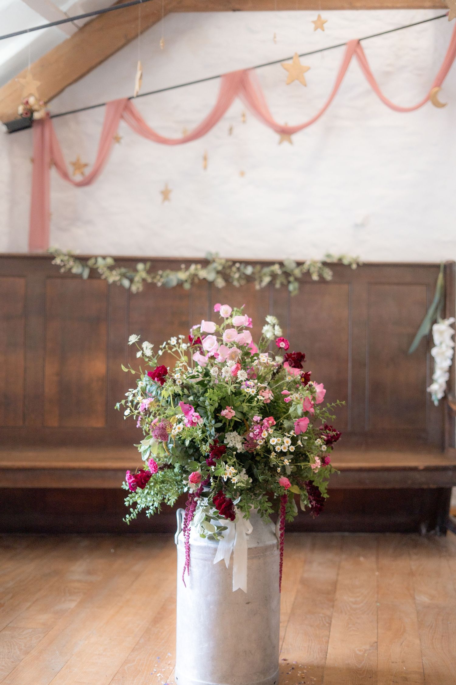 Floral display by Tregarrian Farm at a wedding in Cornwall