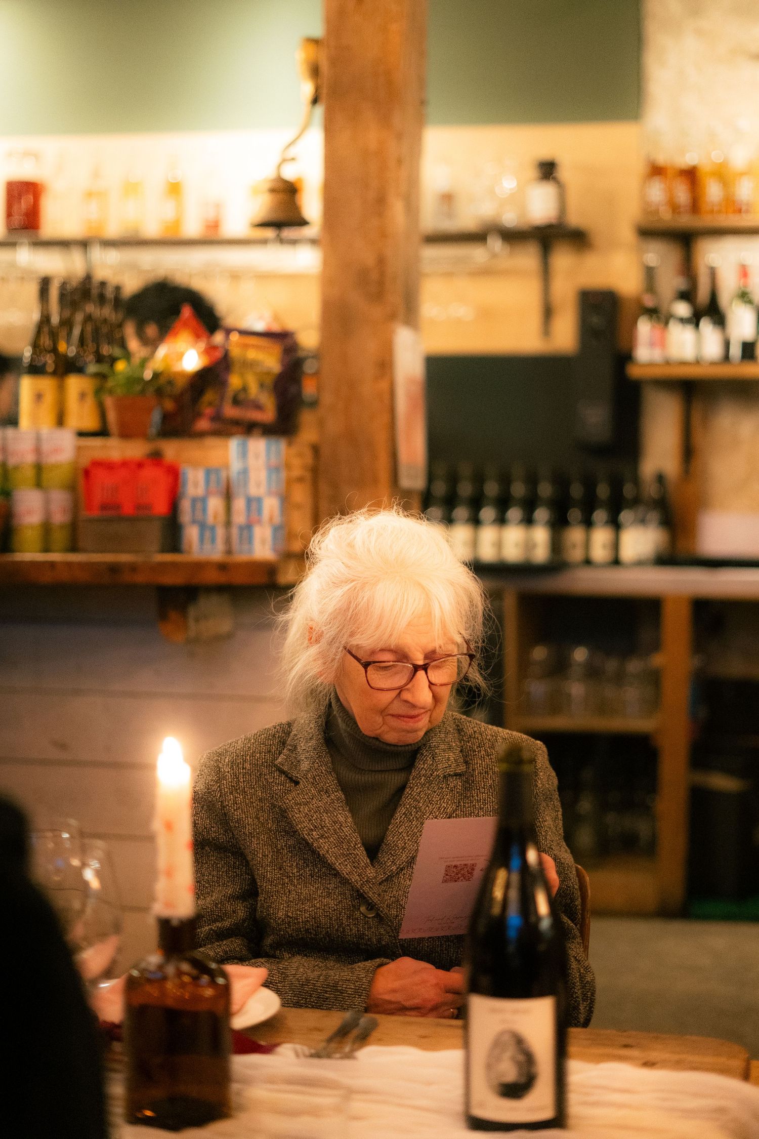 Candid photo of a grandparent at a wedding reception in Cornwall