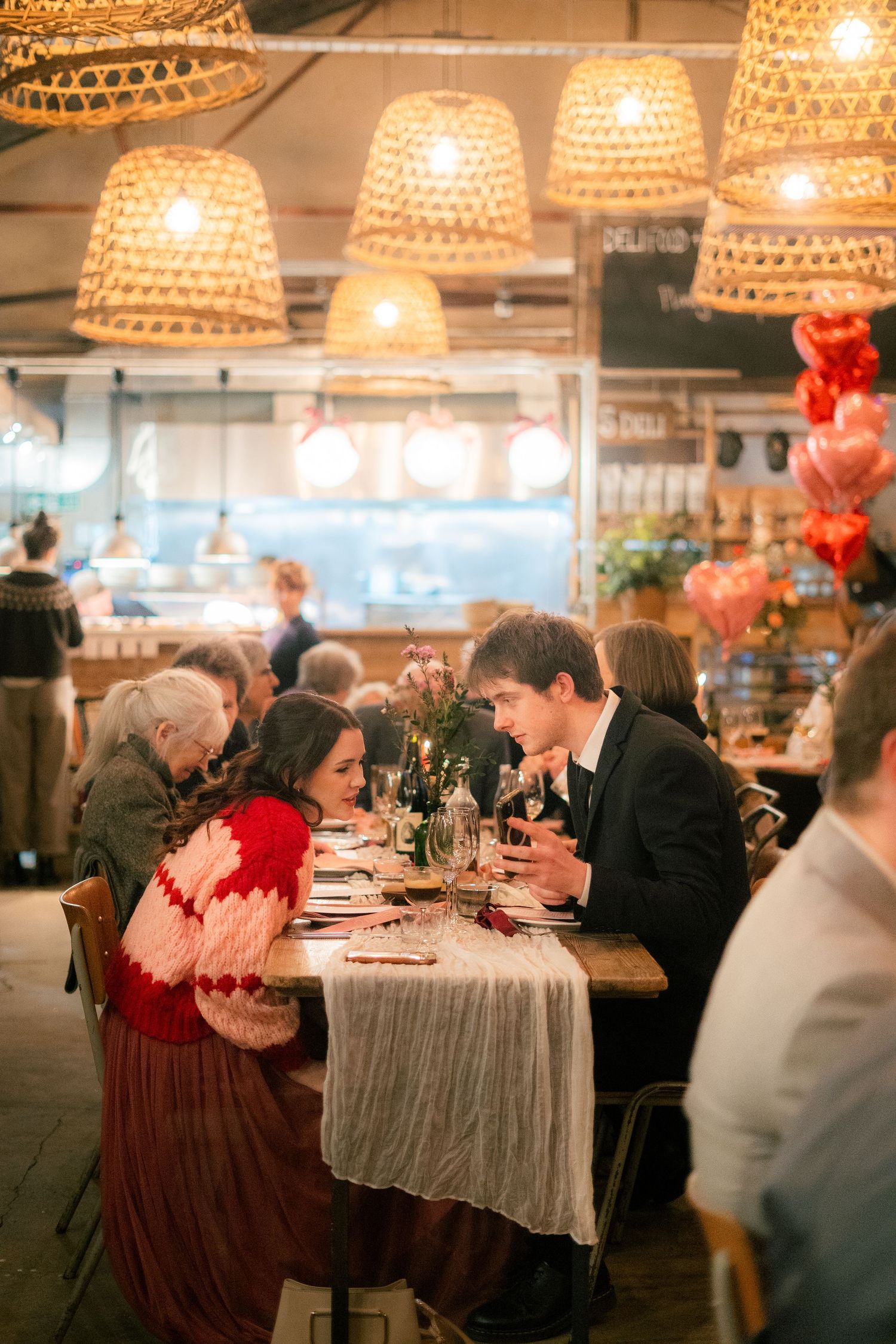 Candid photo of guests at a wedding reception at 45 Queen Street, Penzance, Cornwall