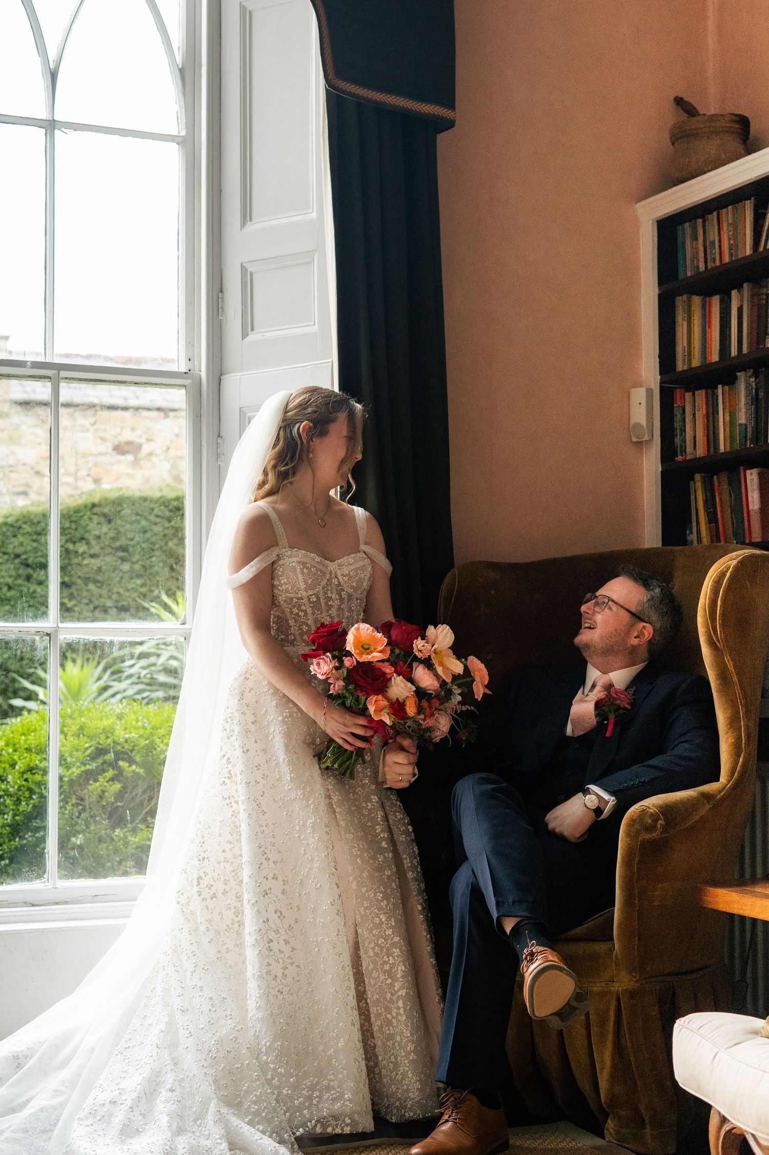 Editorial photo of bride and groom in a Manor House on their wedding day in Cornwall