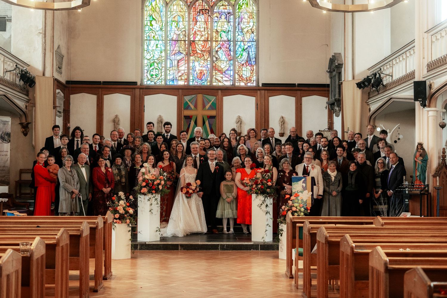Photo of entire wedding party captured inside Penzance Church, Cornwall