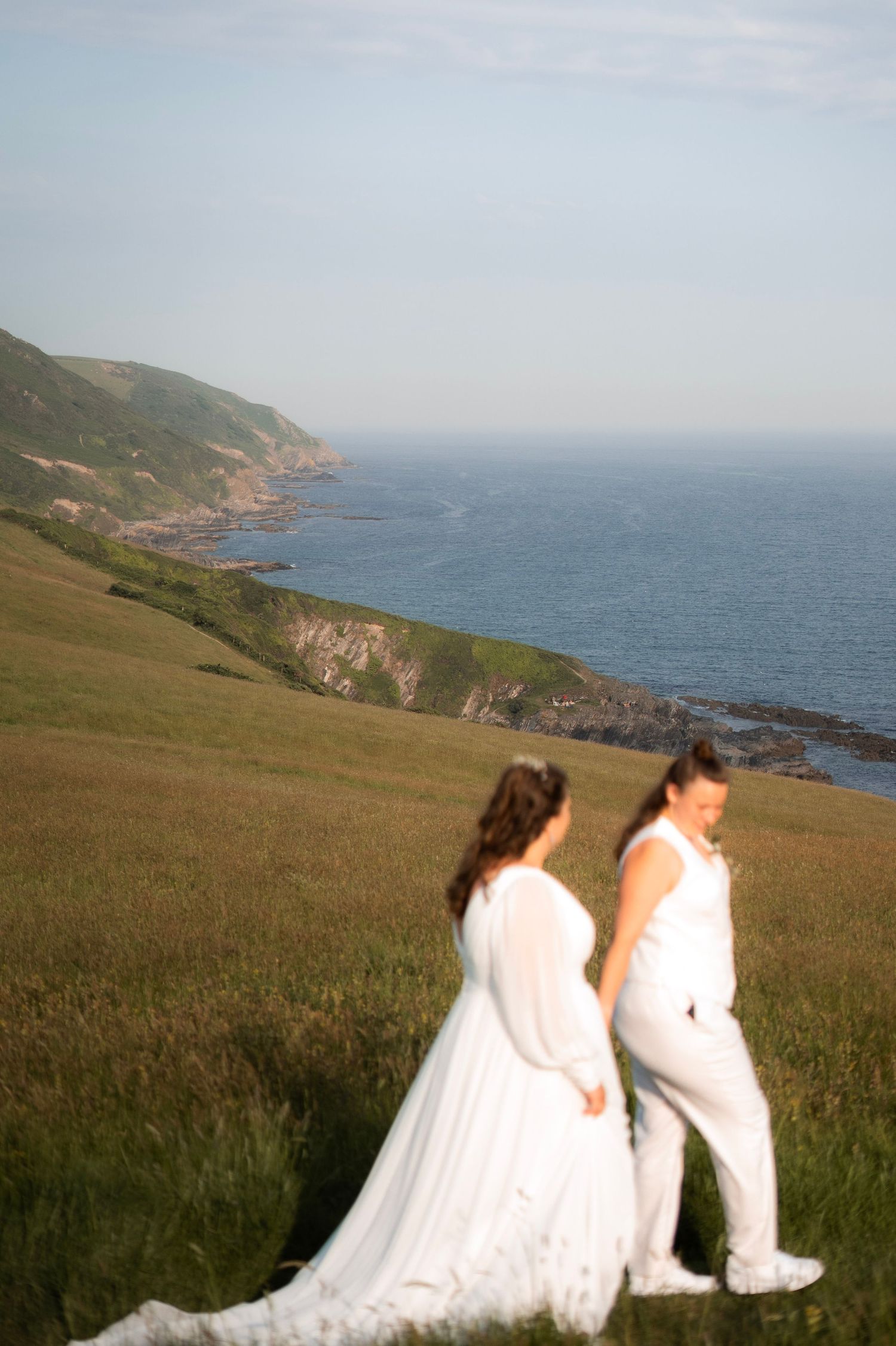Portrait session during a lesbian wedding at Tredudwell Manor, dress from Wed2B and suit from King and Allen