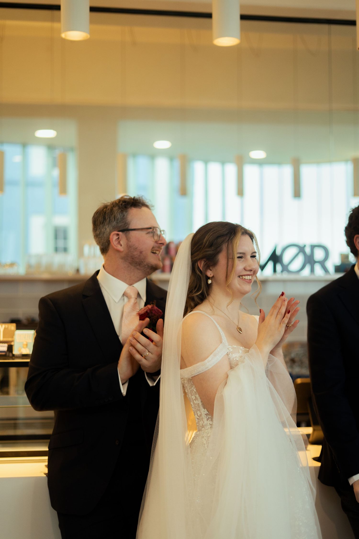 Bride and groom at their wedding reception at Newlyn Art Gallery & The Exchange in Penzance, Cornwall