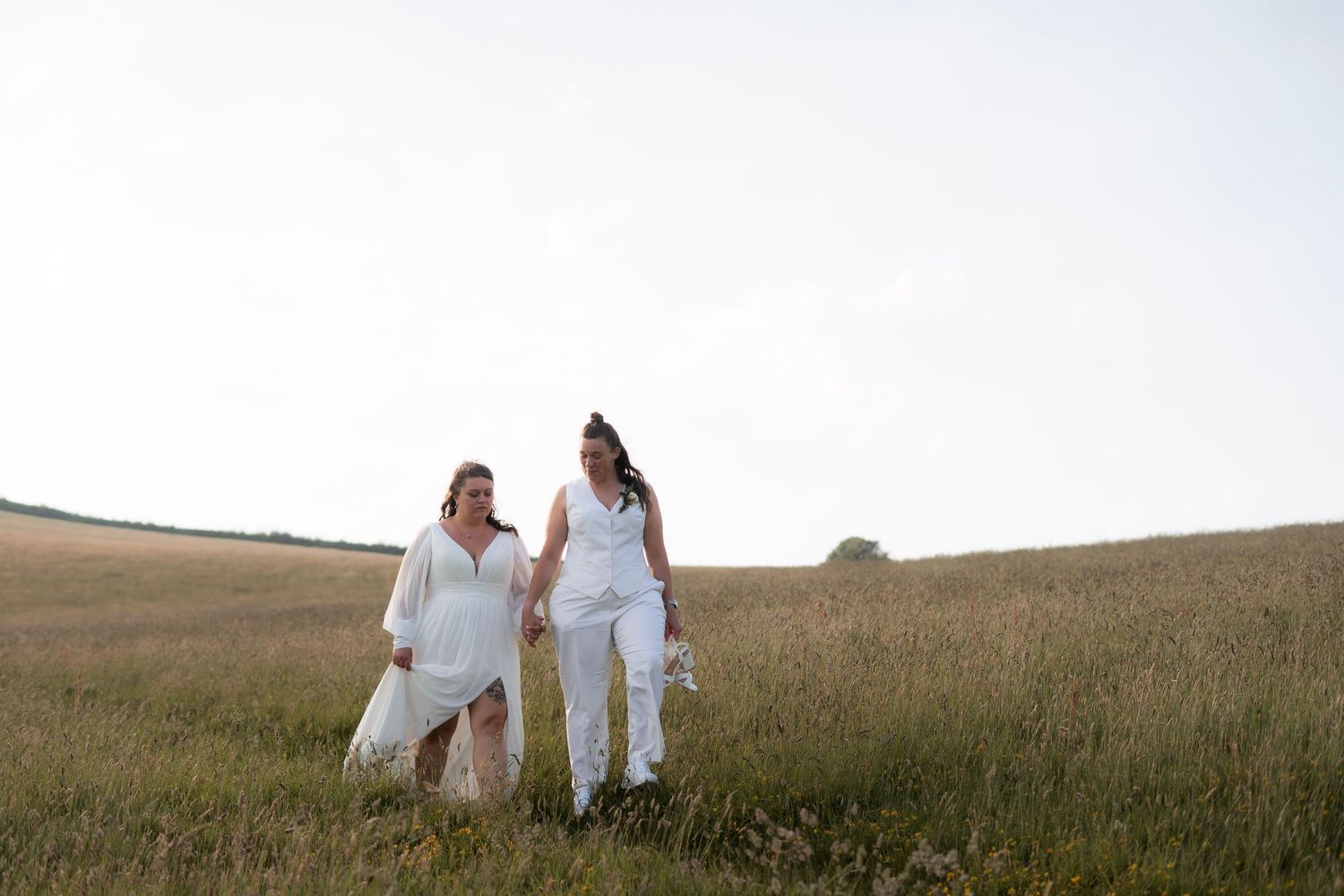 Golden hour wedding photos at Lantivet Bay, lesbian wedding