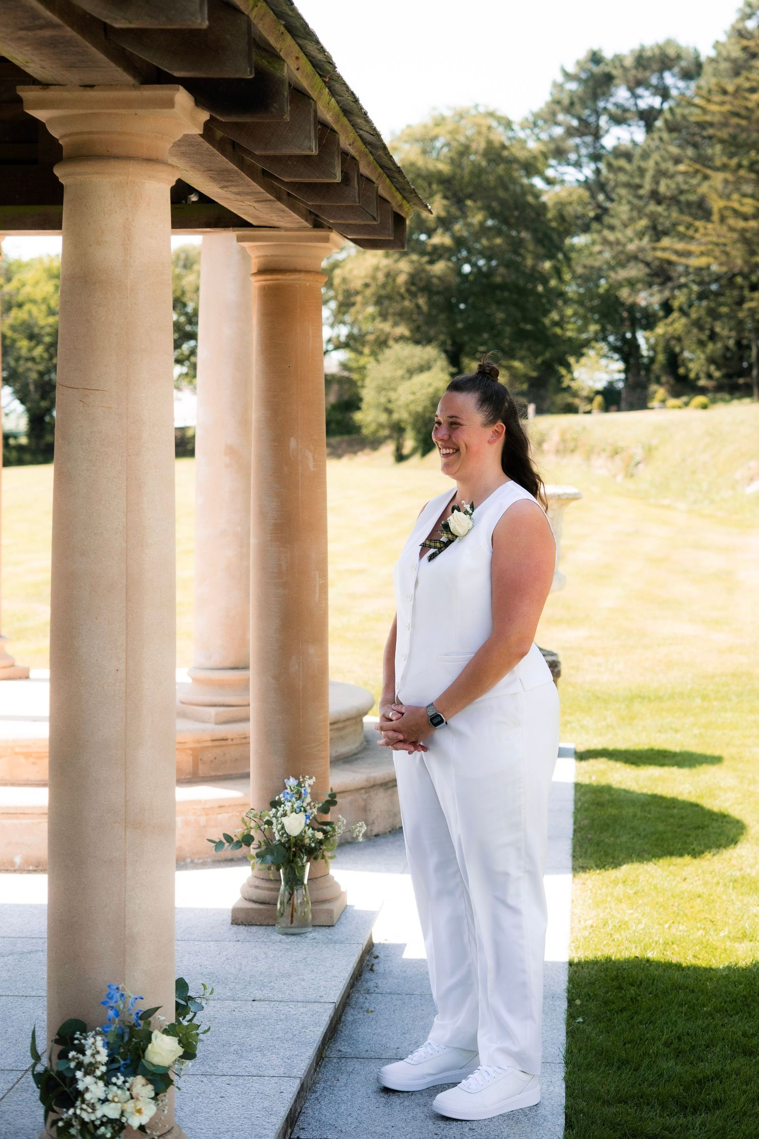 Bride waiting at the alter during her same-sex marriage at Tredudwell Manor