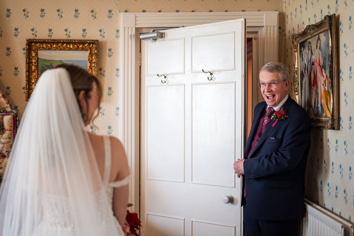 The father of the bride seeing her for the first time on her wedding day in Cornwall