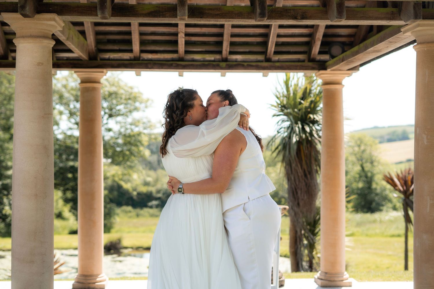 First kiss at Tredudwell Manor same-sex wedding