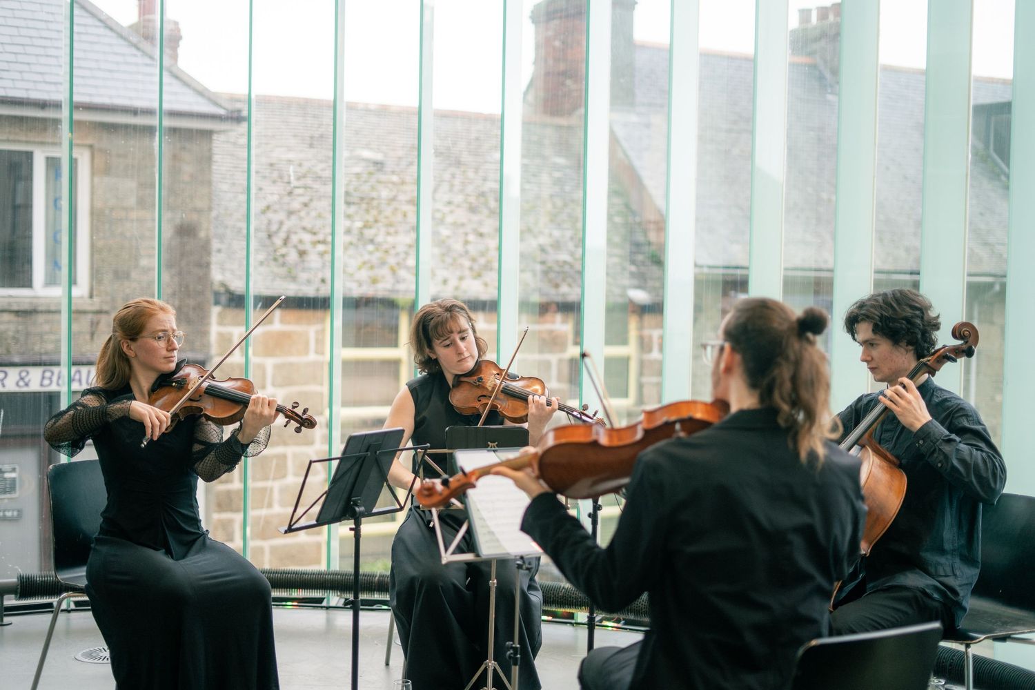 String quartet playing at a wedding reception in Newlyn Art Gallery & The Exchange in Penzance, Cornwall