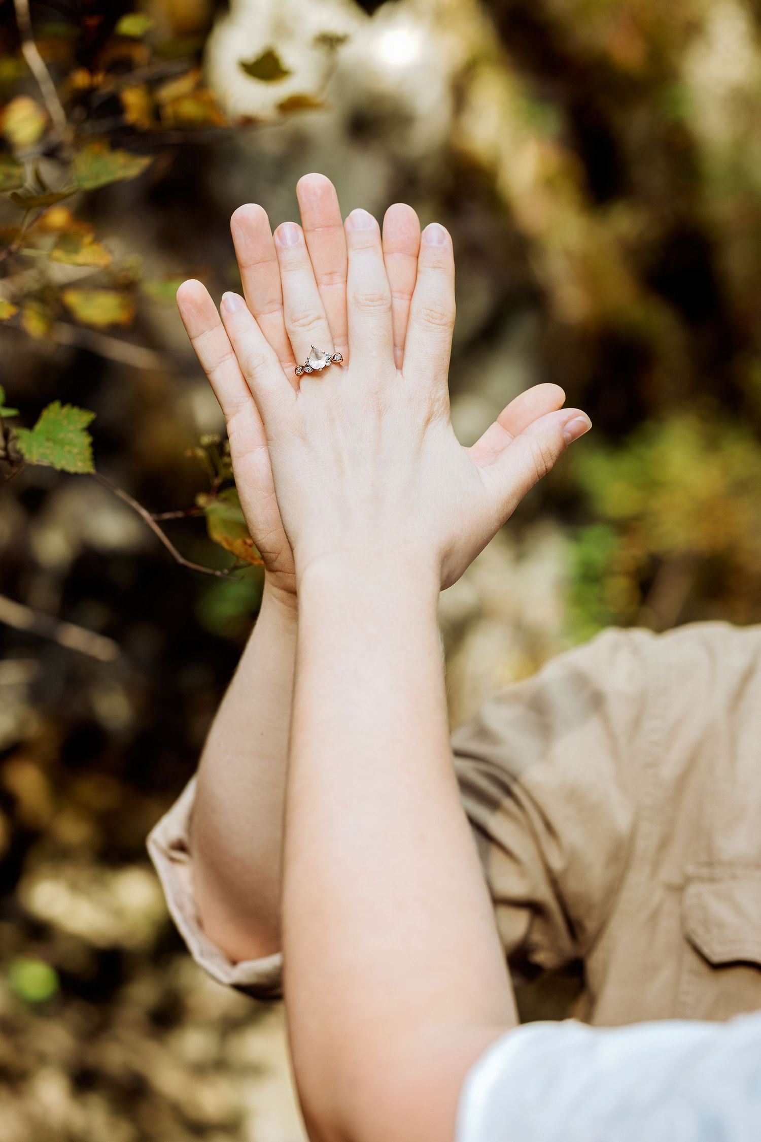 A sequence of photos showing a child's raised hand with a ring against a blurred autumn background.