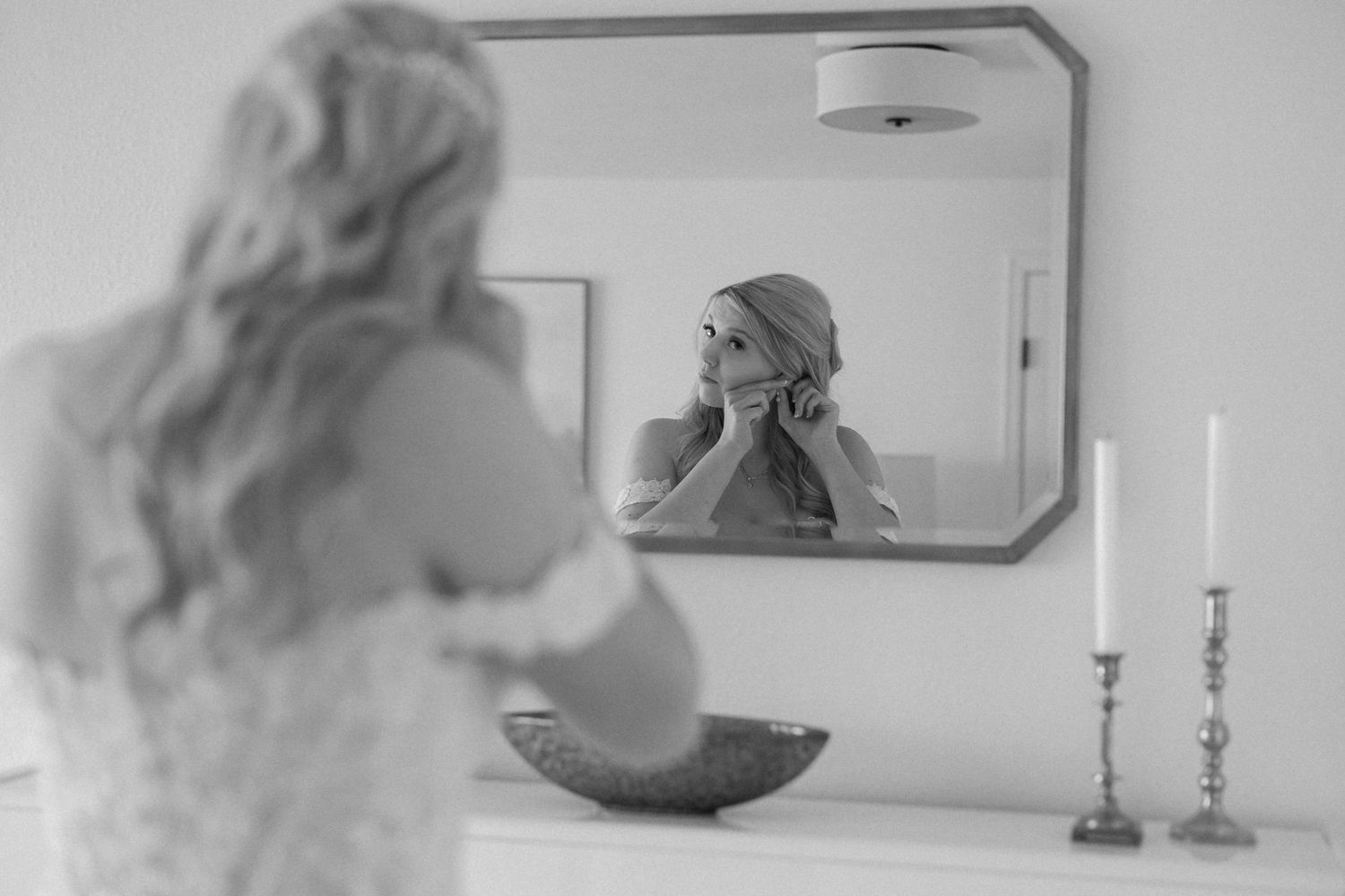 Soft focus black and white getting ready shots in mirror reflection.