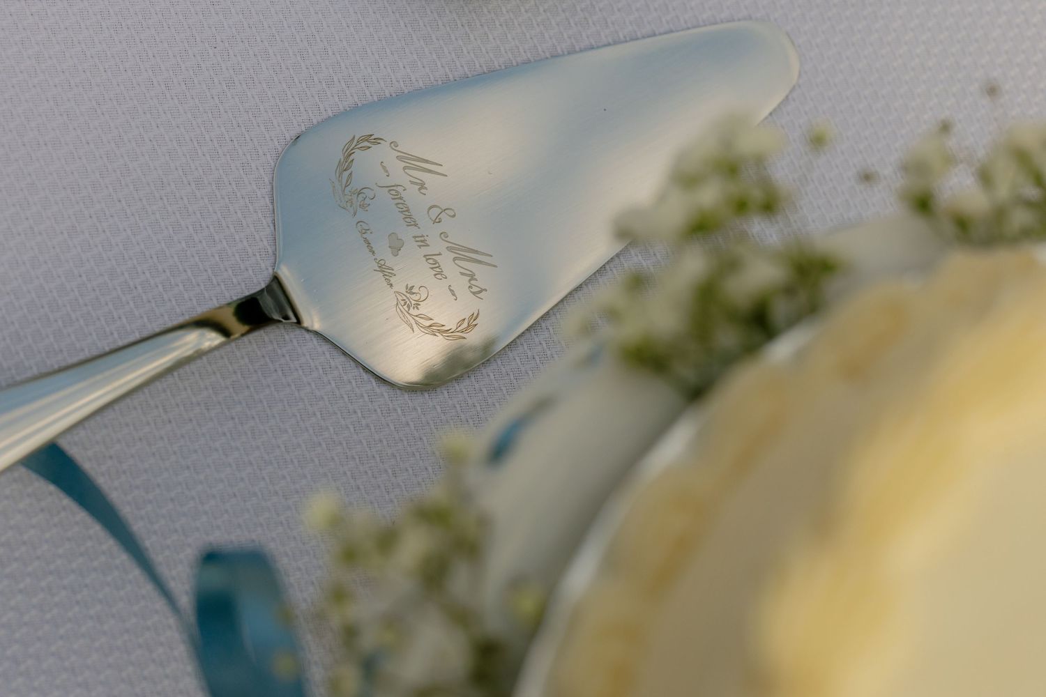 Close-up shots of a knife slicing through a creamy white block of butter in sequence.