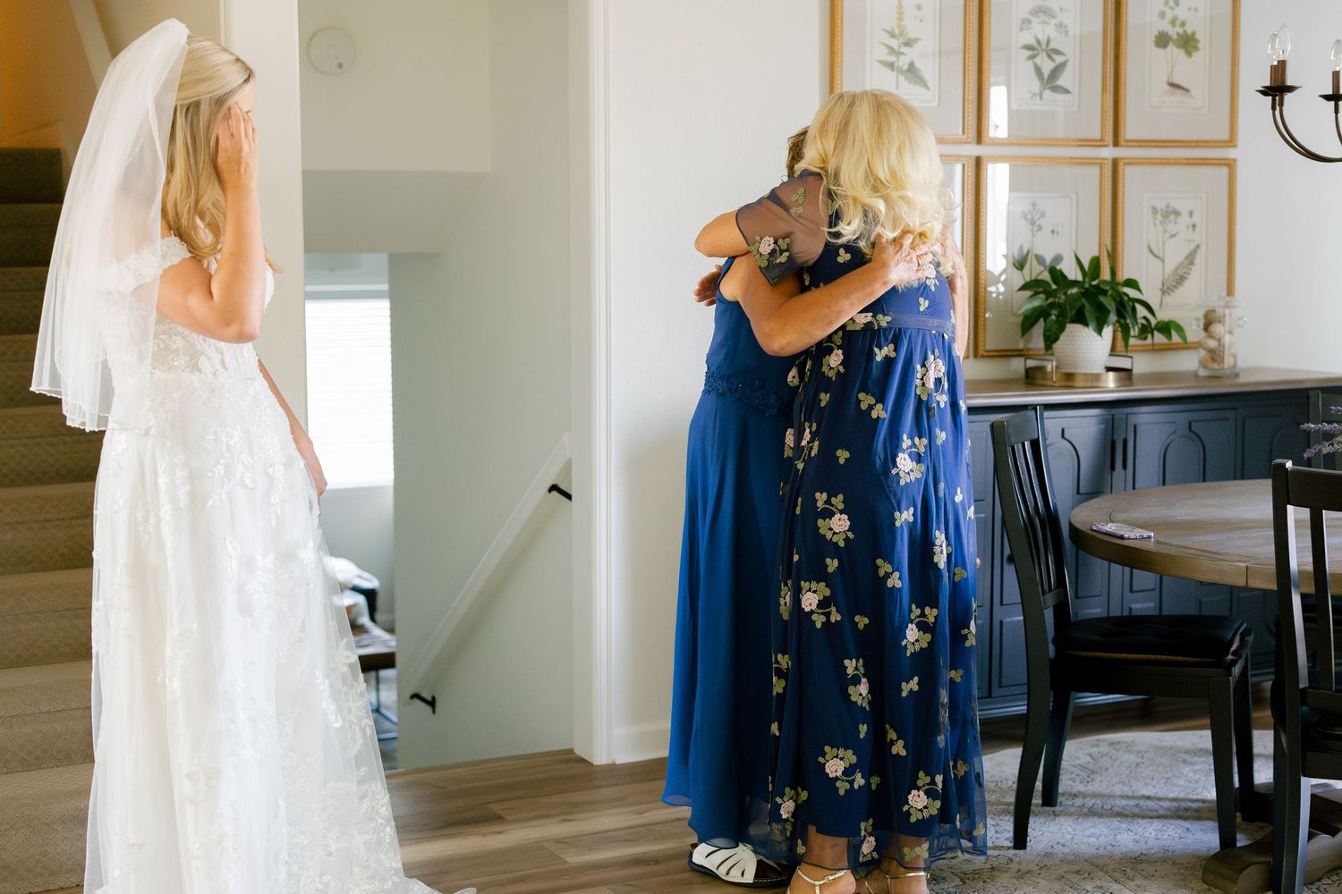 Wedding preparation moments captured in a bright interior space with blue and white attire.