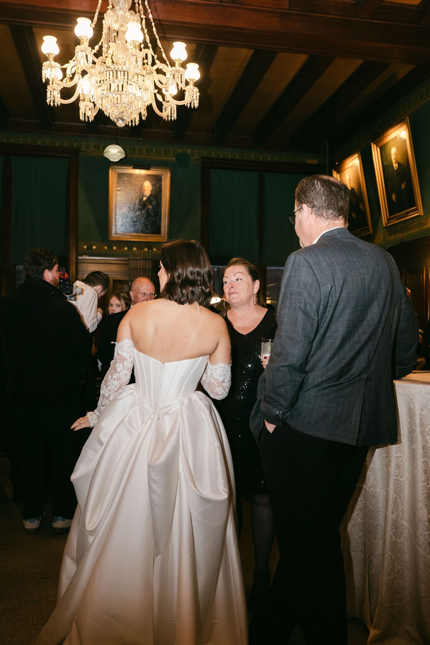 Bride and groom celebrating during cocktail hour captured in documentary film style