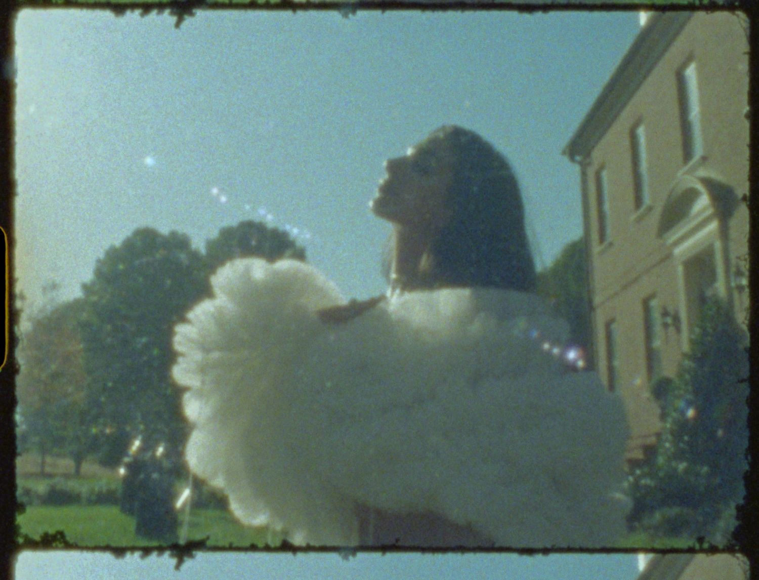 Vintage high fashion inspired wedding moment captured on Super 8 film East Coast