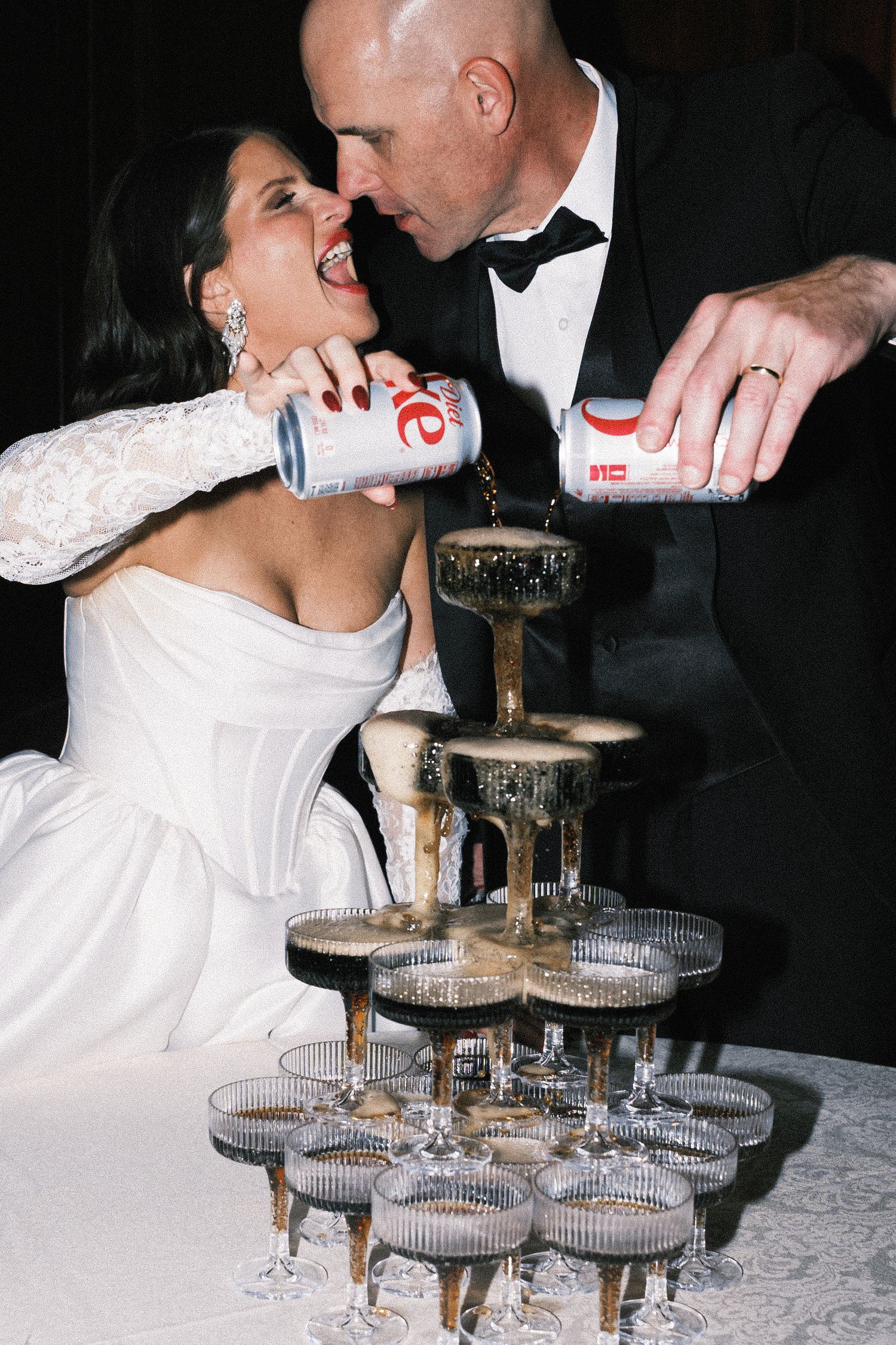 Bride and groom embracing during civil courthouse ceremony in Portland ME captured in documentary film style High fashion editorial style