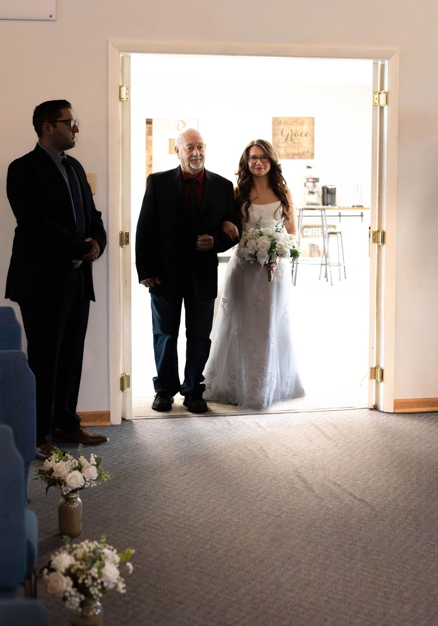 A sequence of four wedding photos showing people waiting in a hallway with white walls and grey carpet.