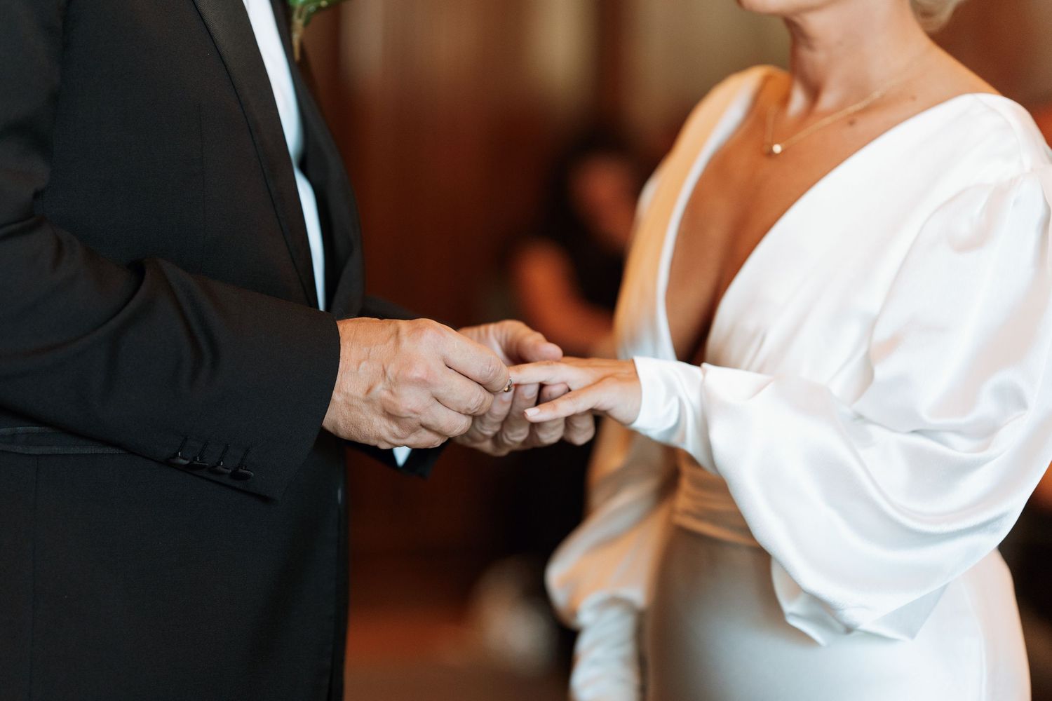 Close-up details of formal wedding attire preparations.