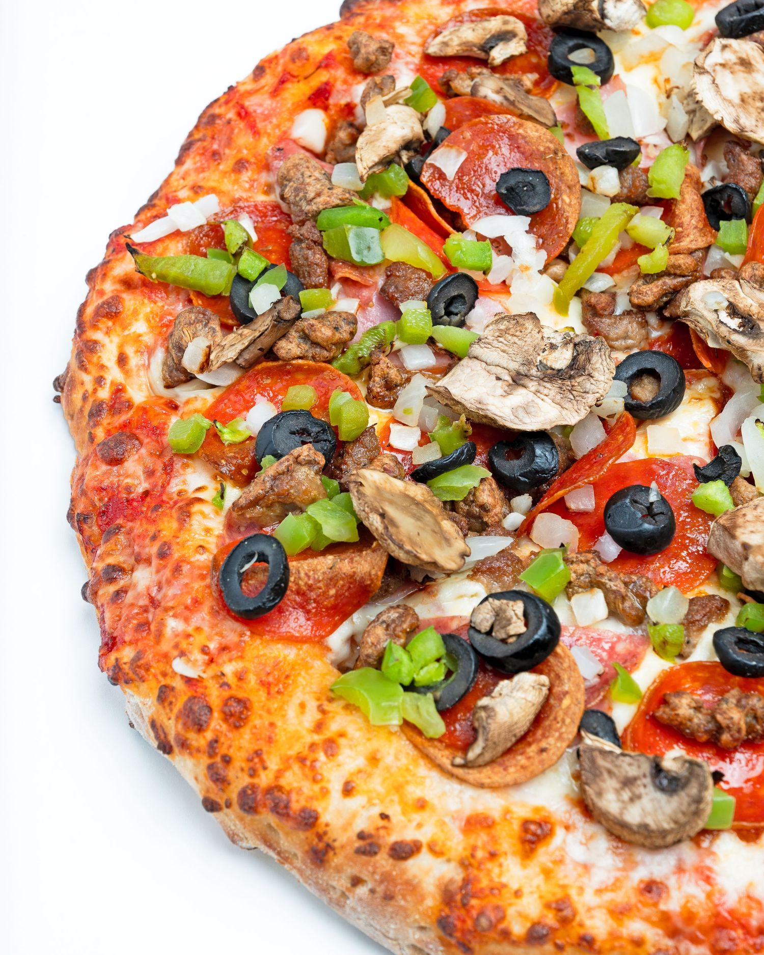 Half pizza isolated on white background with crispy crust, pepperoni, sausage and golden melted cheese.