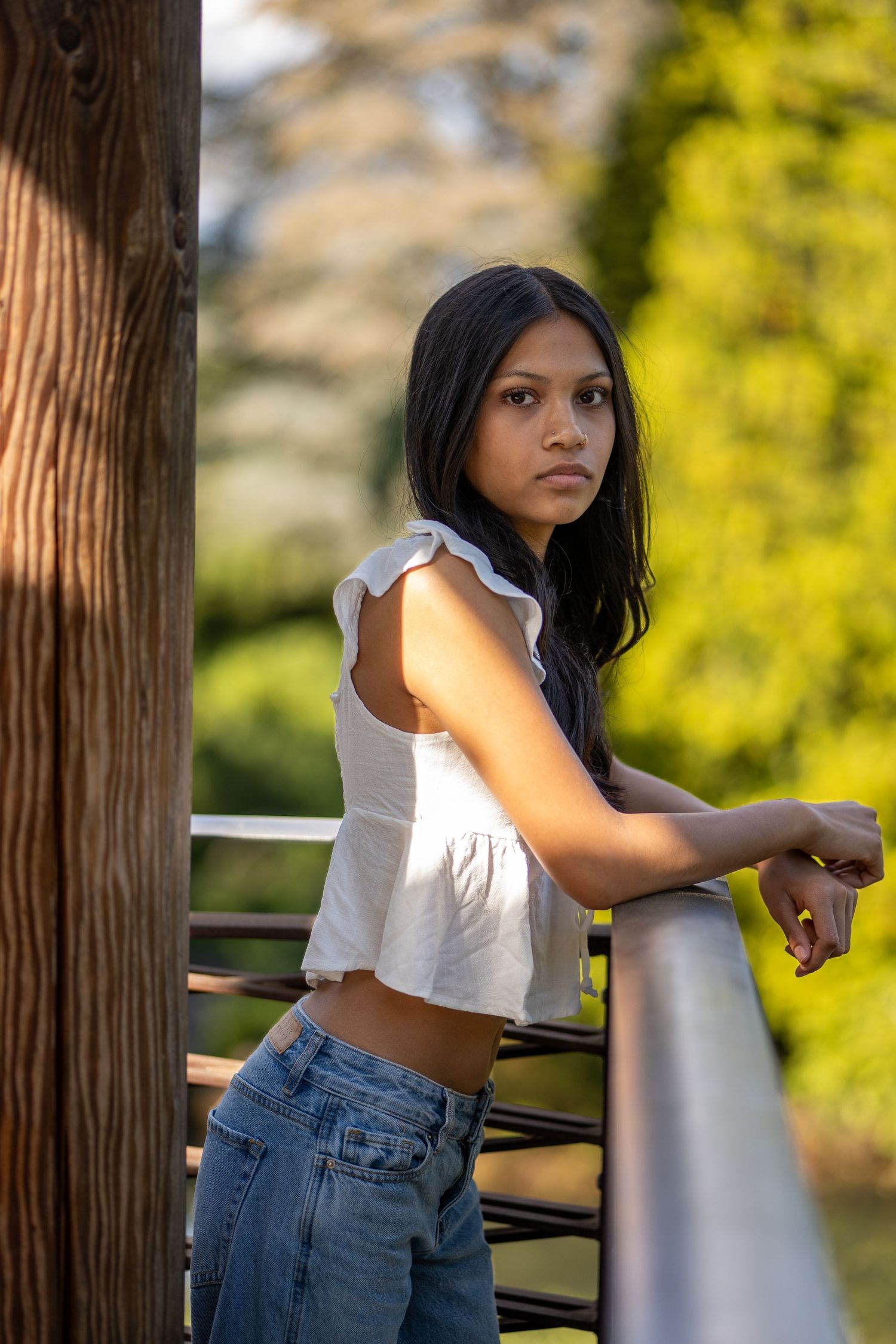 Outdoor lifestyle portrait in golden light with shallow depth. Cinematic, natural, and warm.