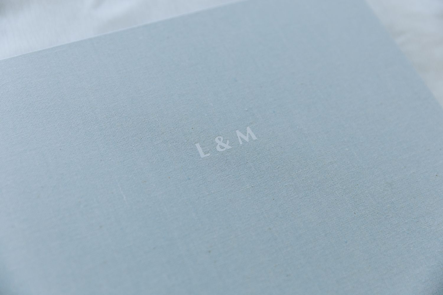 Couverture minimaliste en lin d'album photo de famille professionnel personnalisé.