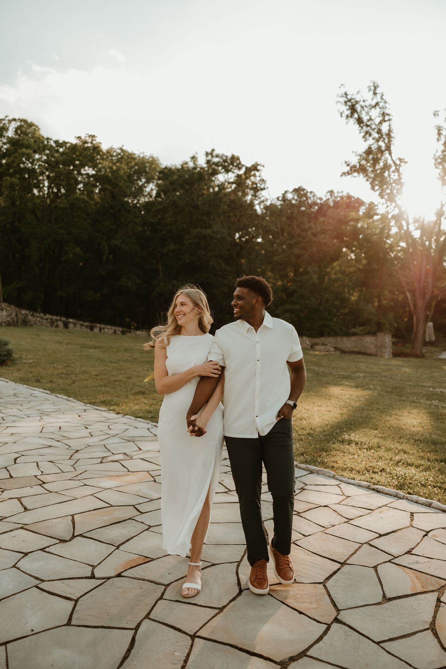 Candid engagement photo of a couple sharing a golden hour moment in Nashville, Tennessee luxury romantic high end