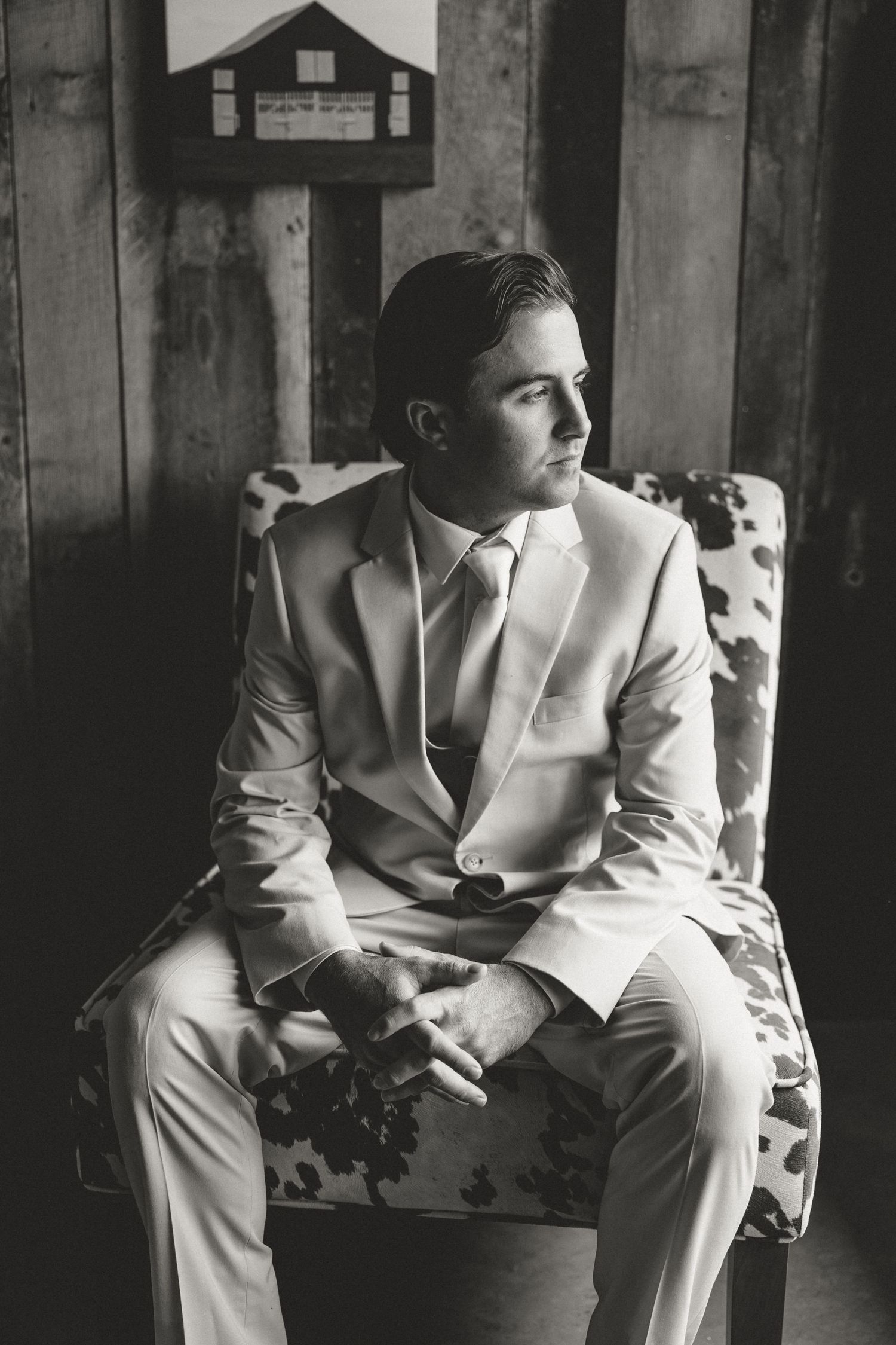Groom portrait at a Tennessee wedding venue, featuring classic wedding attire and warm, timeless wedding photography.
