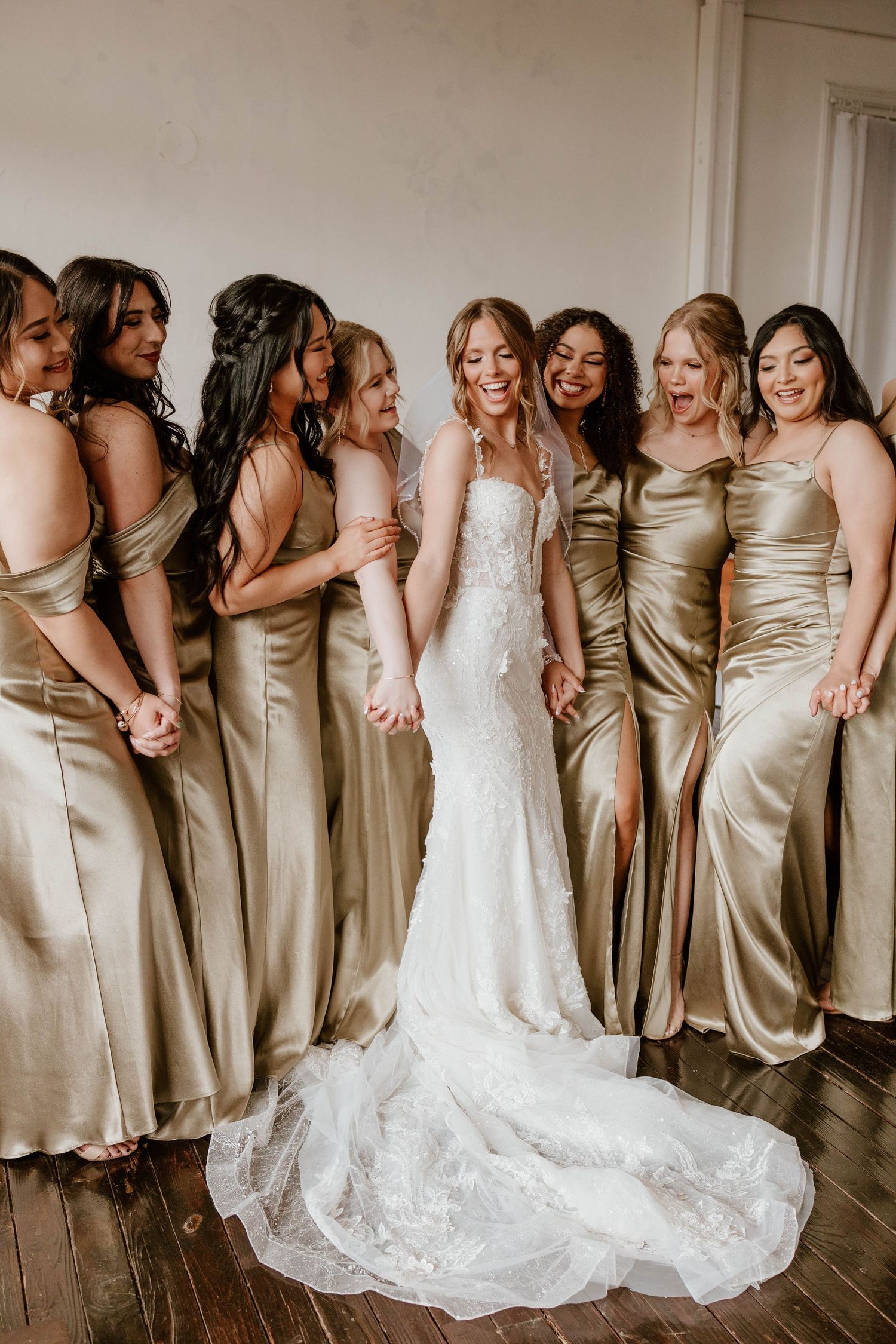 Light and airy bridal party candid photo in a warm neutral wedding suite in Middle Tennessee. true color. timeless high end