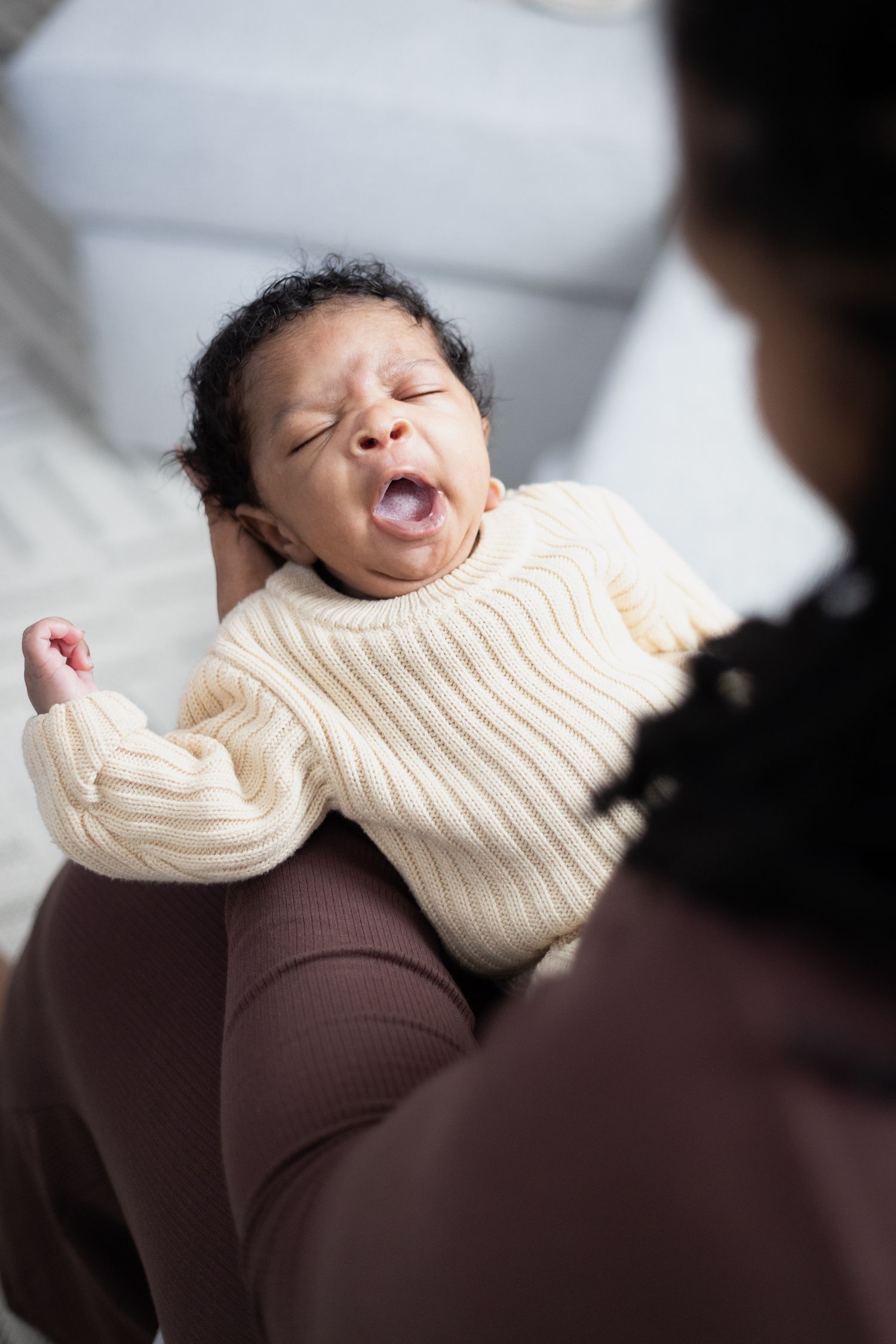 Newborn yawns on mothers lap | Bijou-Marie d'Image | Richmond VA Photography
