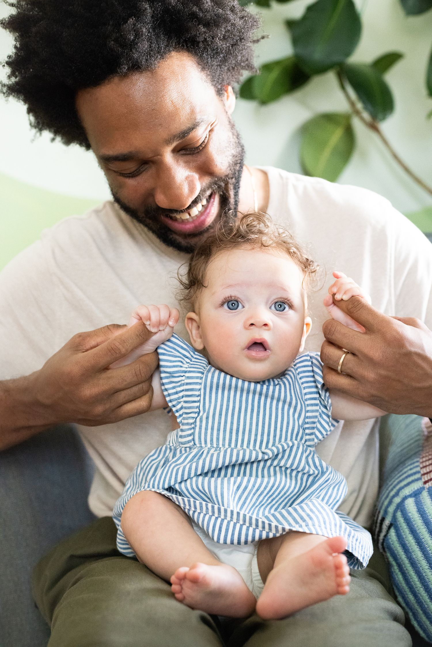 Father holding baby on his lap in soft natural light | Bijou-Marie d'Image | Richmond VA Photography