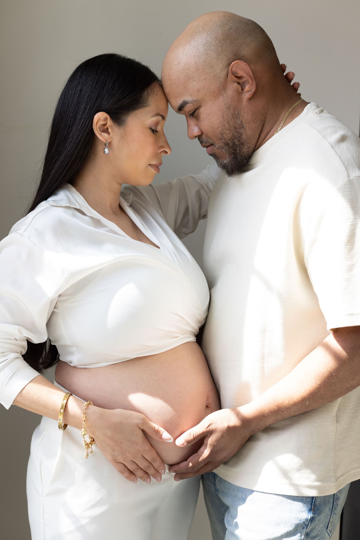 Natural light portrait of parents holding the baby bump | Bijou-Marie d'Image | Richmond VA Photography