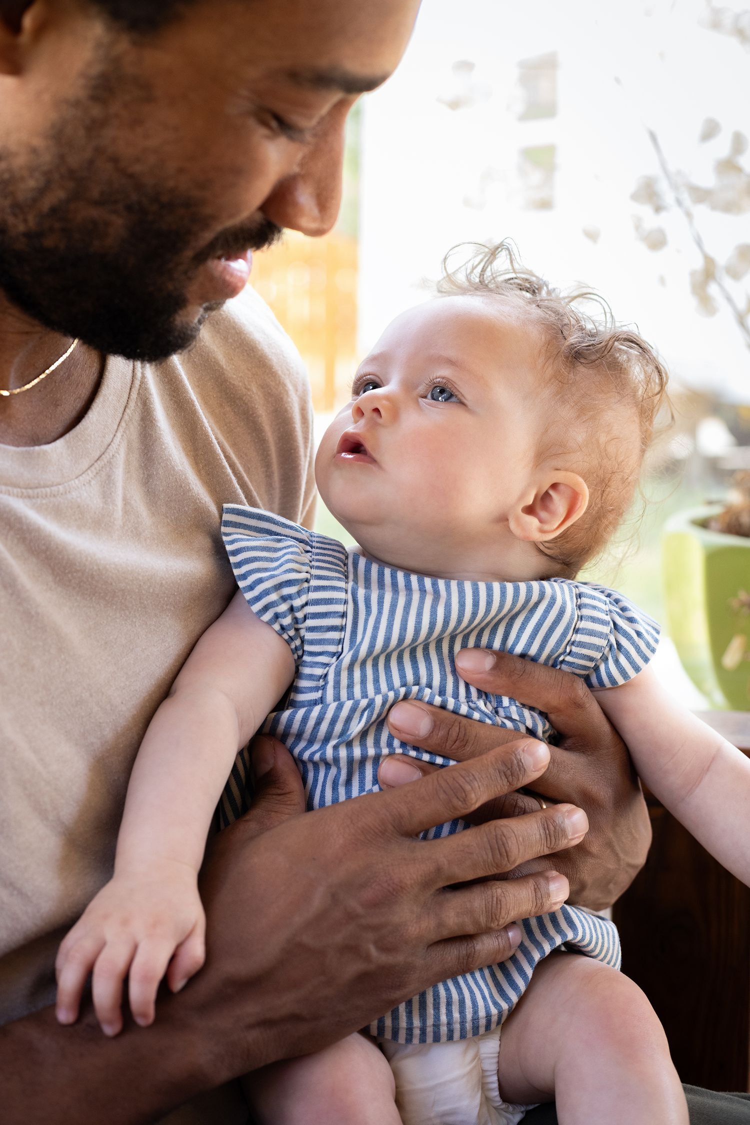 Newborn and father looking at each other | Bijou-Marie d'Image | Richmond VA Photography