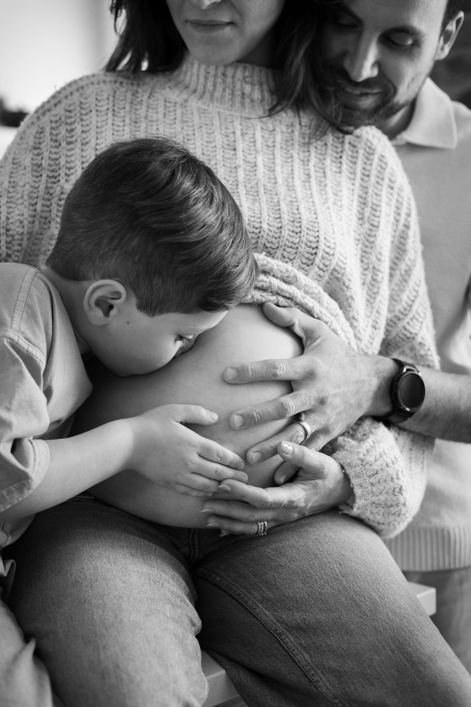 Expectant family holding and kissing the belly bump | Bijou-Marie d'Image | Richmond VA Photography