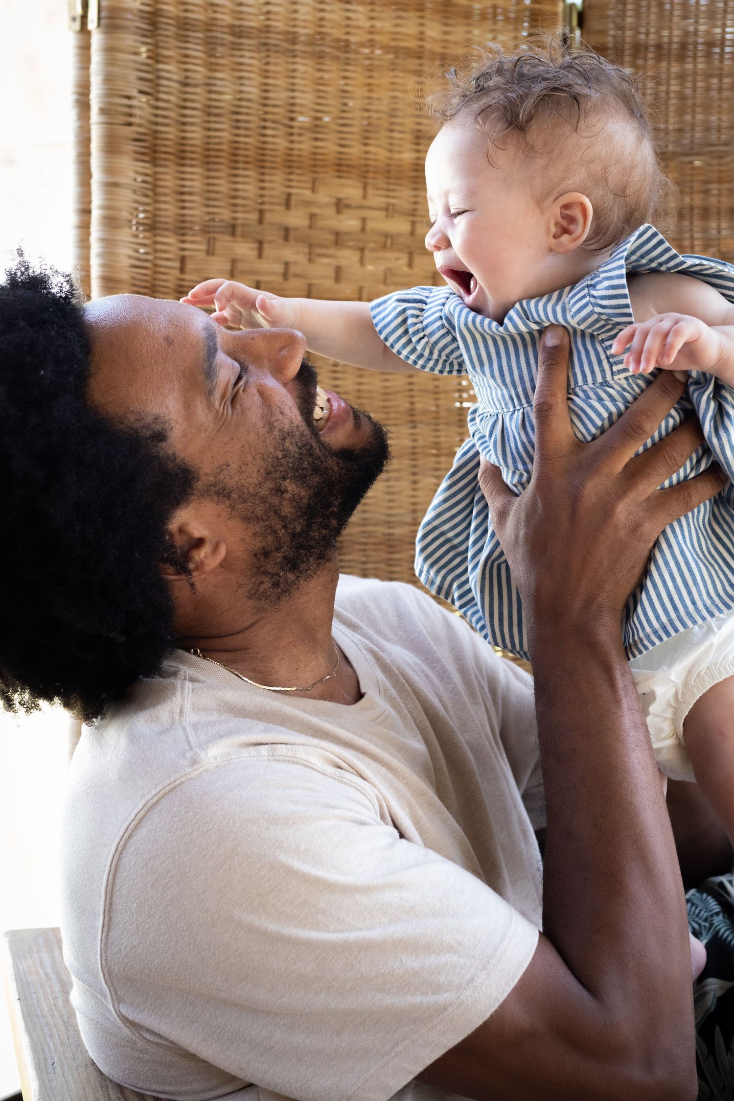 Playful moment between father and newborn | Bijou-Marie d'Image | Richmond VA Photography
