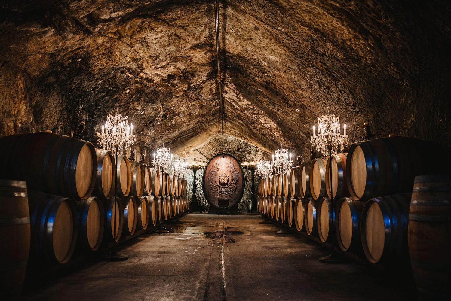 Wine barrels lining a long cave at the Buena Vista Winery