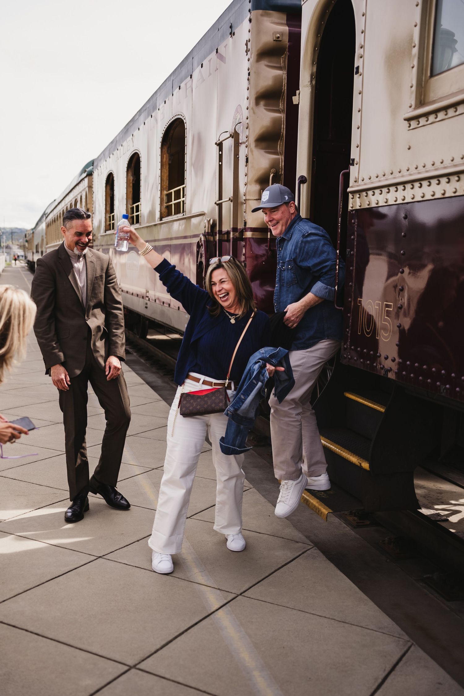 Woman posing in front of the Napa Valley wine train