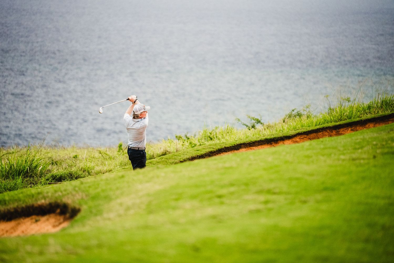 Photo of a golfer at a golf course in Lanai Hawaii for a sales incentive trip captured by Fantasma Imagery