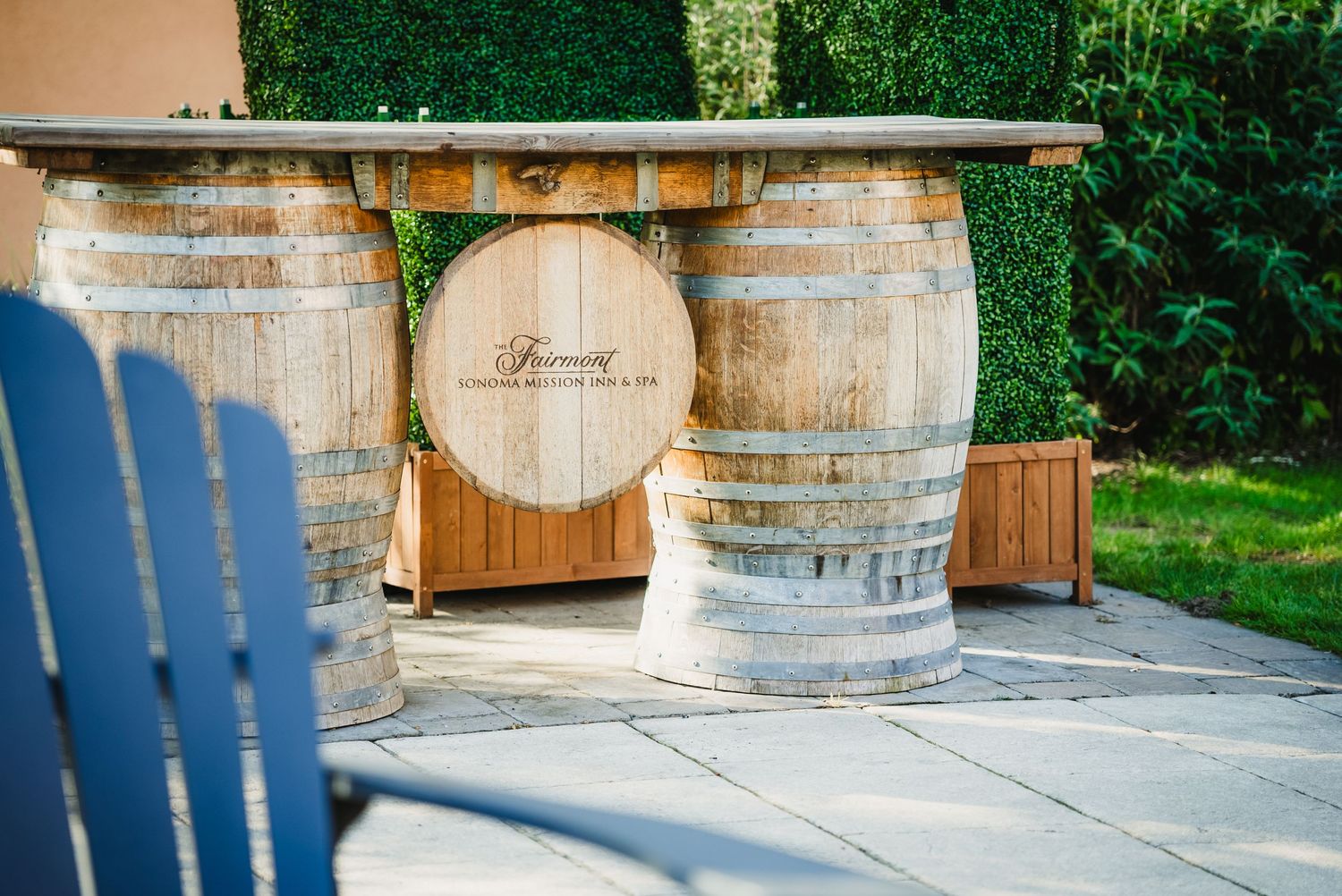 Wine barrels with Fairmont Sonoma logo on them.
