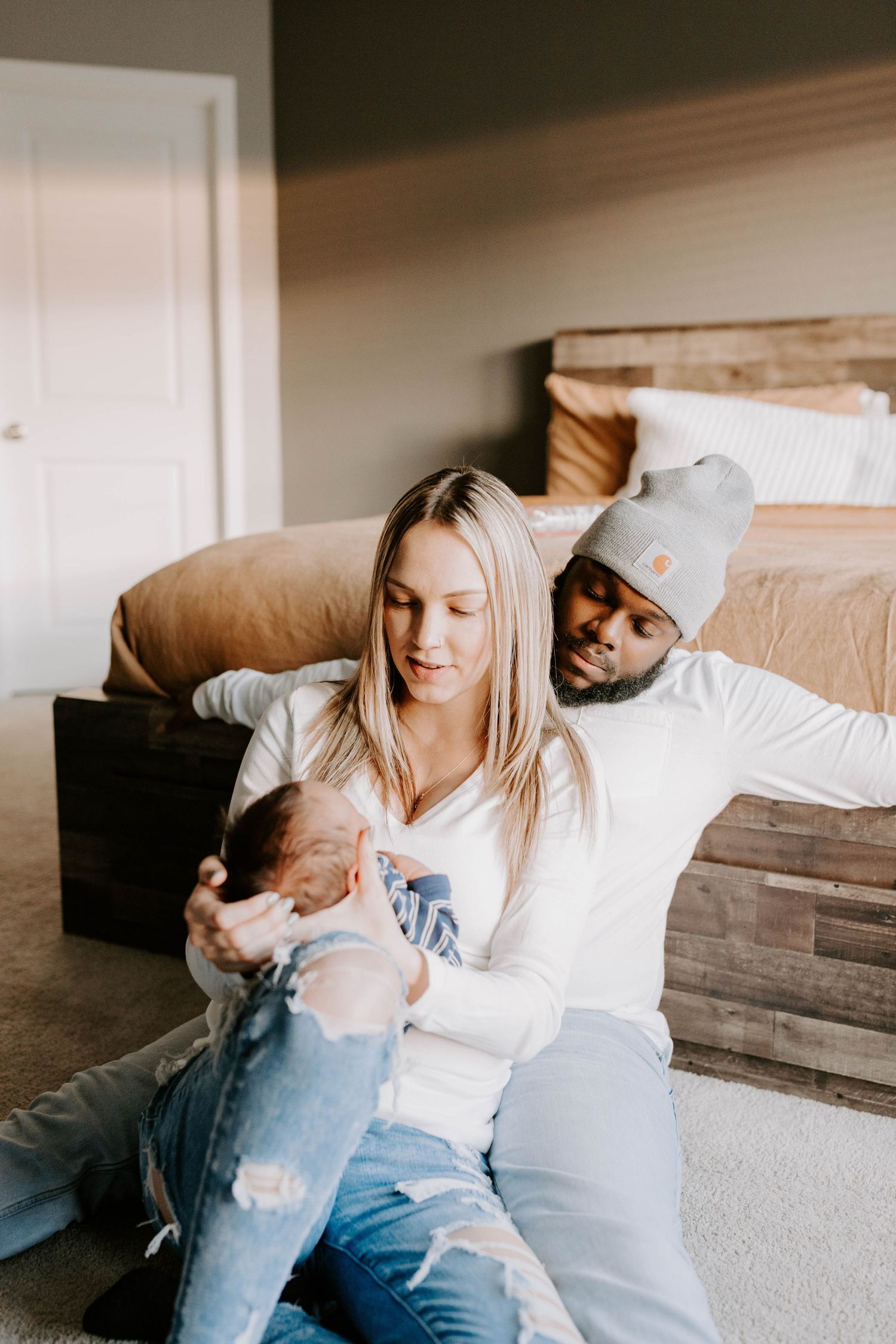 Colorado newborn photographer capturing cozy in-home baby portraits and heartfelt family moments.