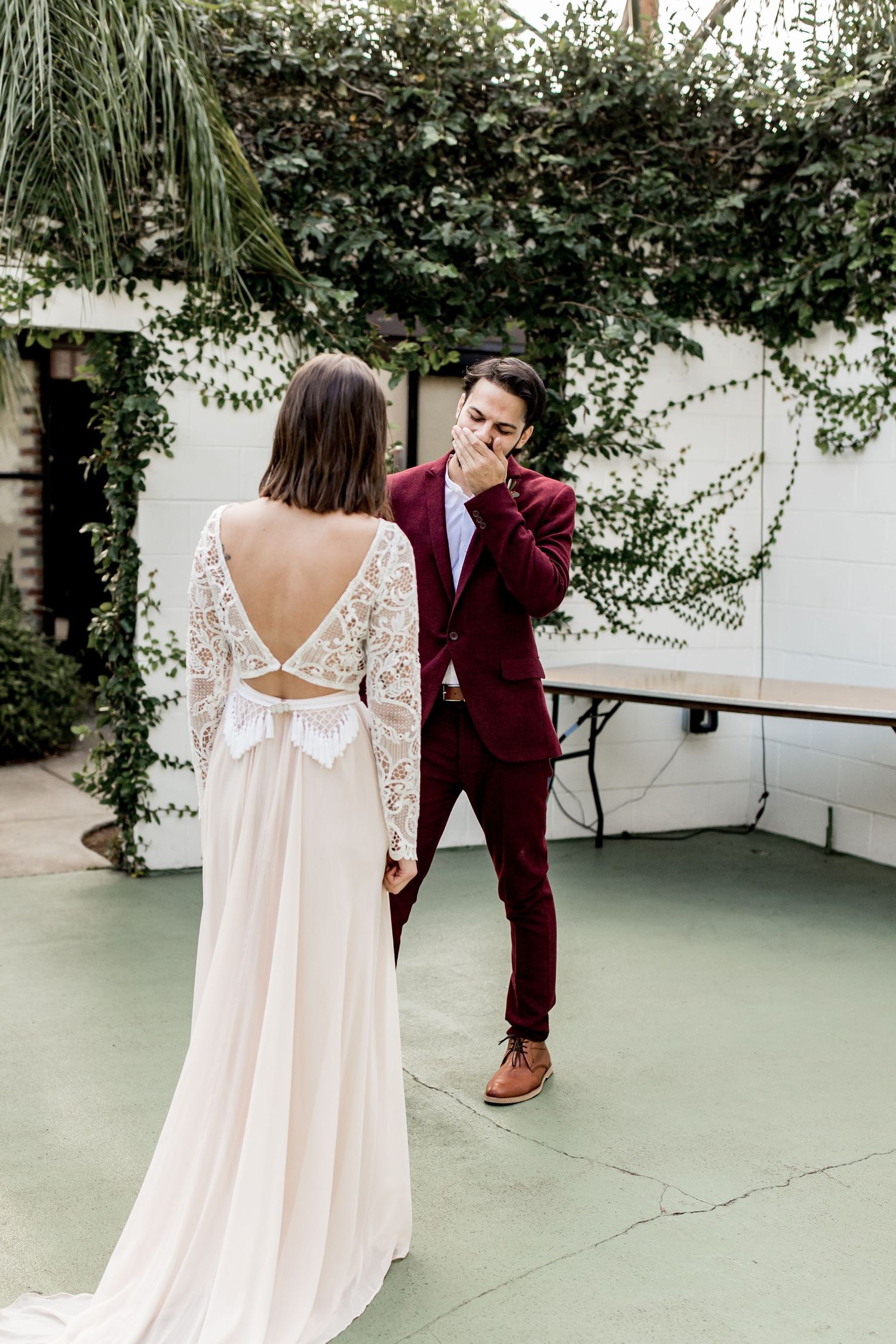 Colorado & destination wedding photographer capturing candid bride and groom moments during an emotional wedding day celebration.