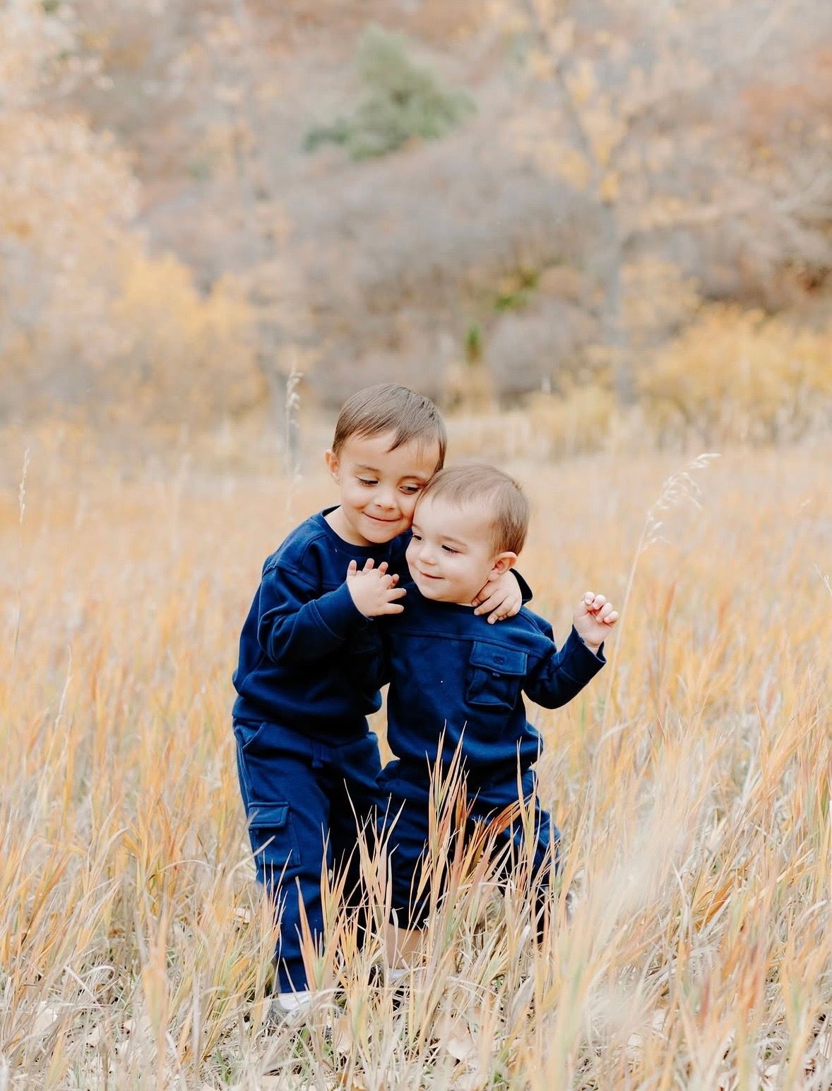 Colorado family photographer capturing candid family moments with natural light and genuine connection.