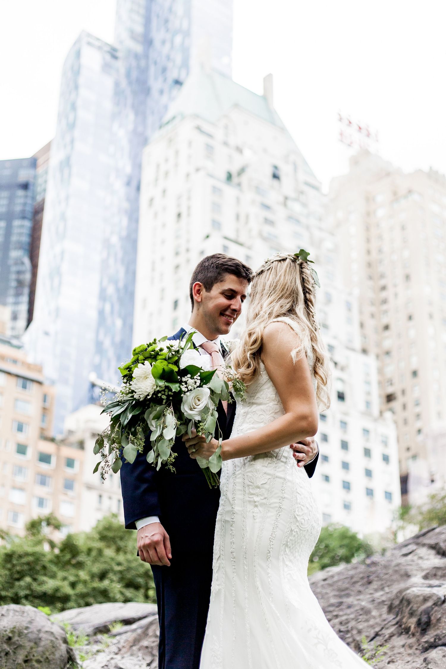 Colorado & destination wedding photographer capturing candid bride and groom moments during an emotional wedding day celebration.
