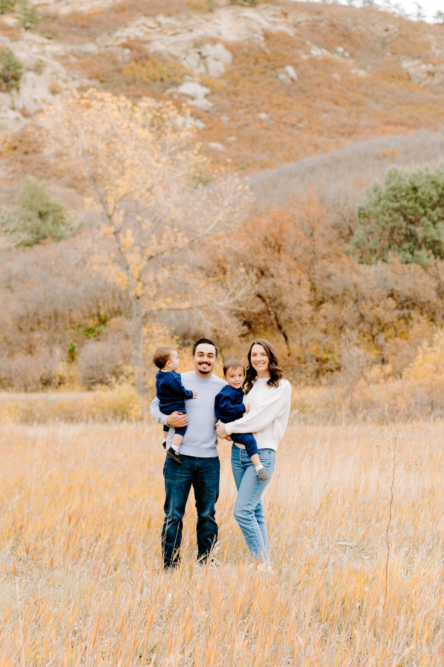 Colorado family photographer capturing candid family moments with natural light and genuine connection.
