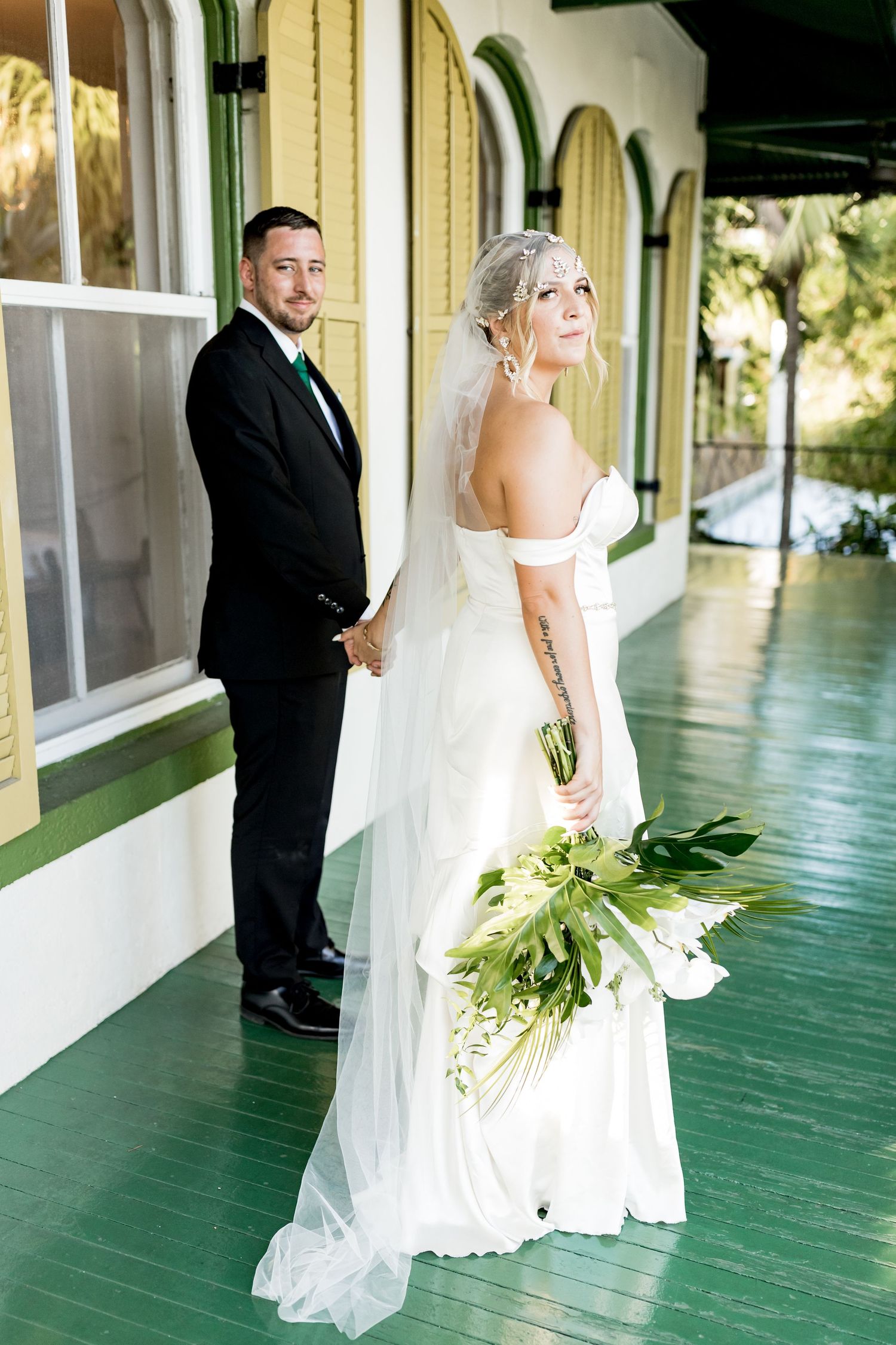 Colorado & destination wedding photographer capturing candid bride and groom moments during an emotional wedding day celebration.