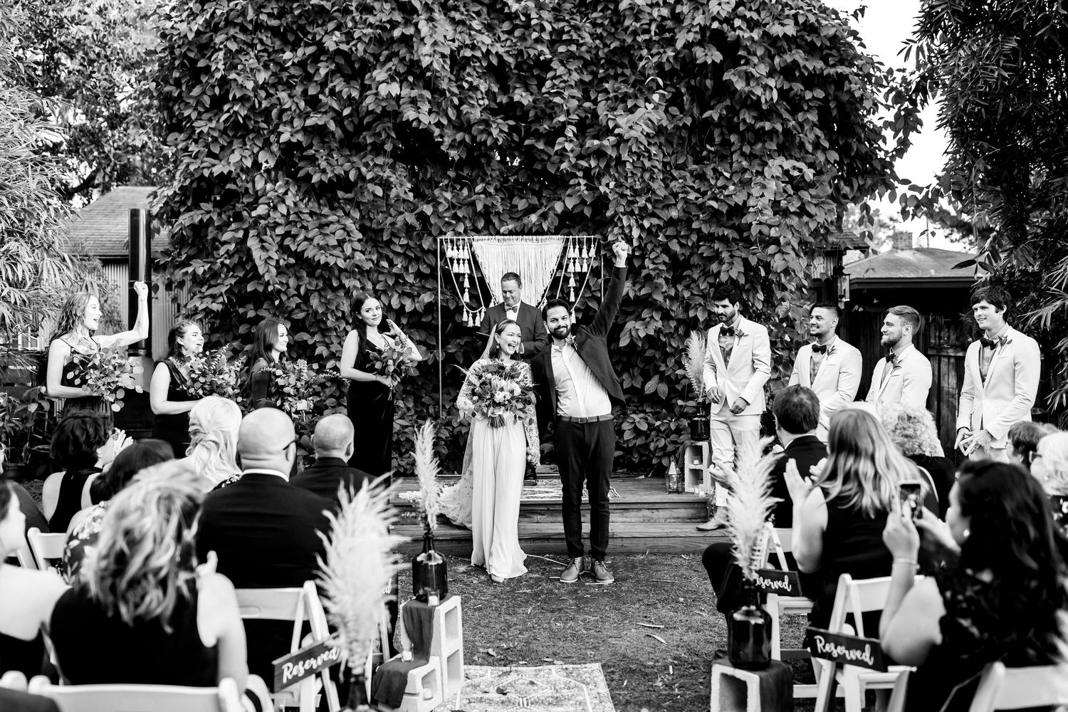 Colorado & destination wedding photographer capturing candid bride and groom moments during an emotional wedding day celebration.