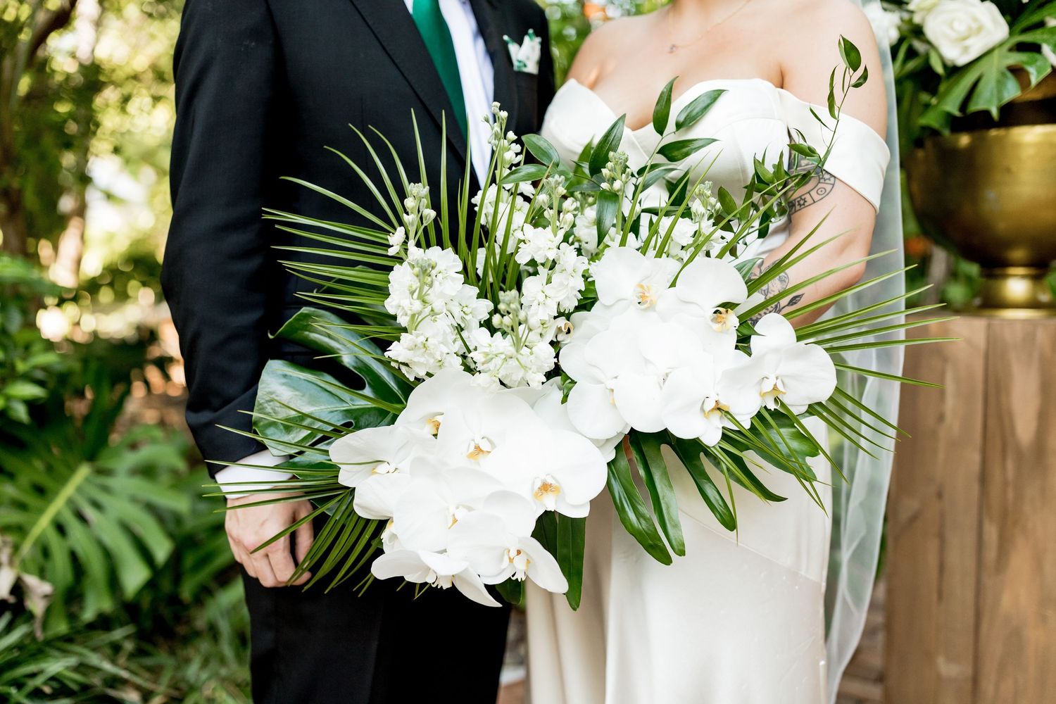 Colorado & destination wedding photographer capturing candid bride and groom moments during an emotional wedding day celebration.